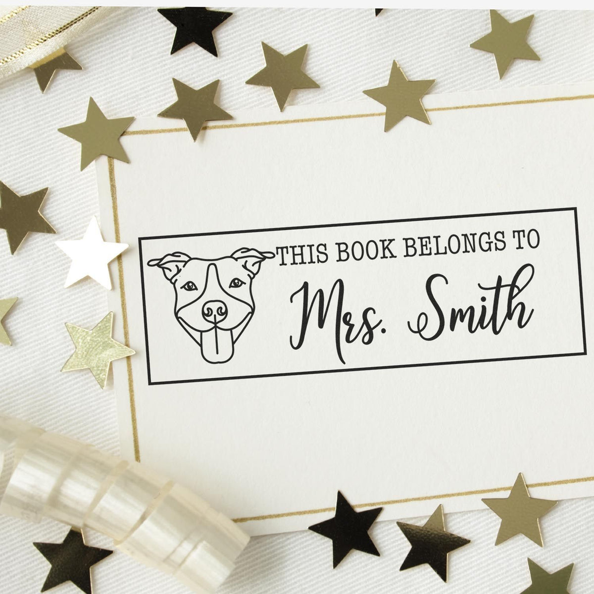 Custom bookplate rubber stamp with dog illustration and This Book Belongs to Mrs. Smith for personal library books.