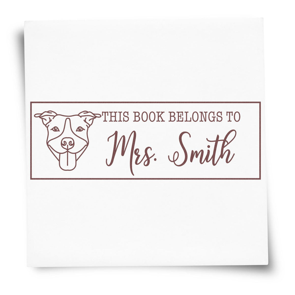 Personalized rubber stamp for books: This Book Belongs to Mrs. Smith with dog illustration for dog lovers and libraries.