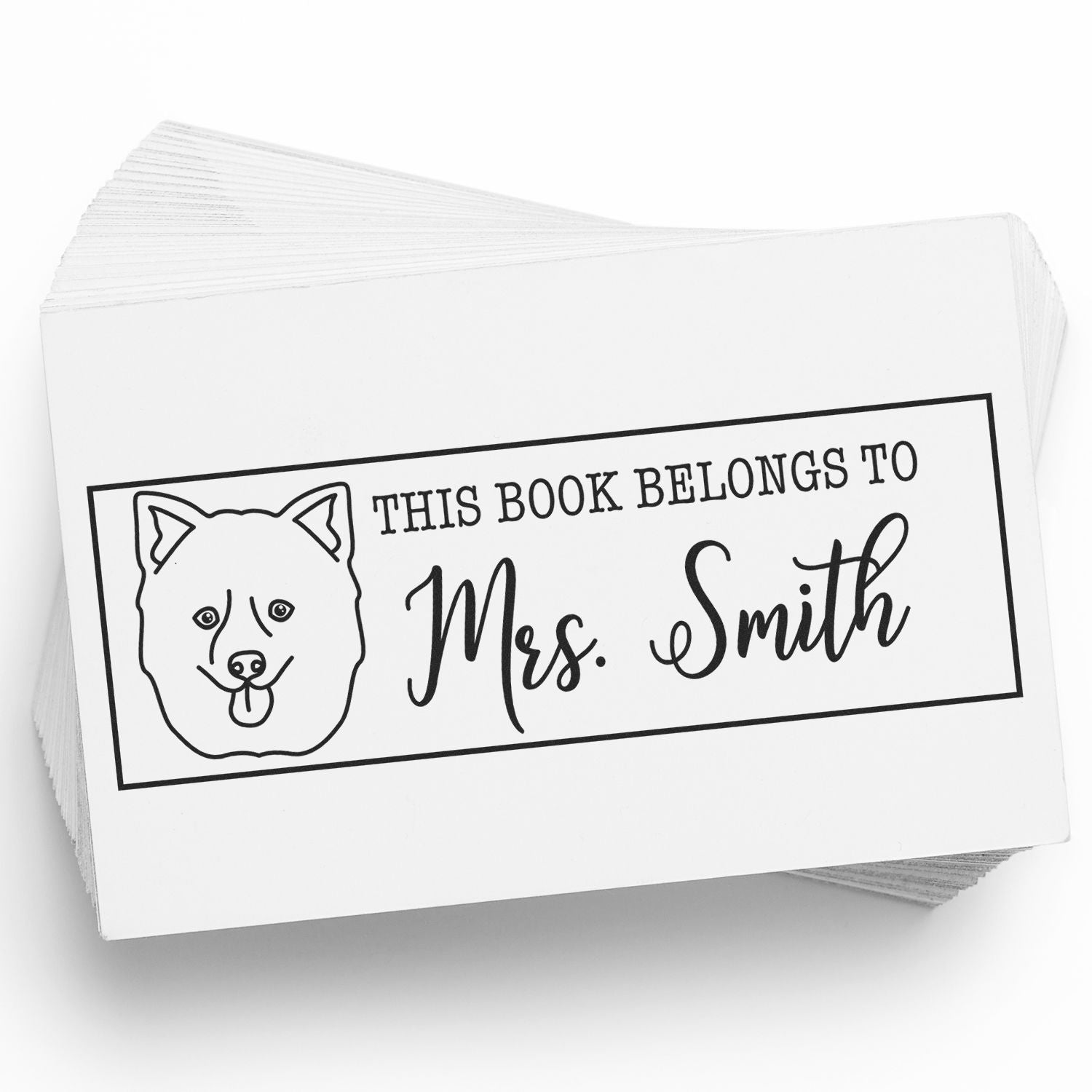 Custom dog ex libris rubber stamp reading This Book Belongs to Mrs. Smith for personal library books.