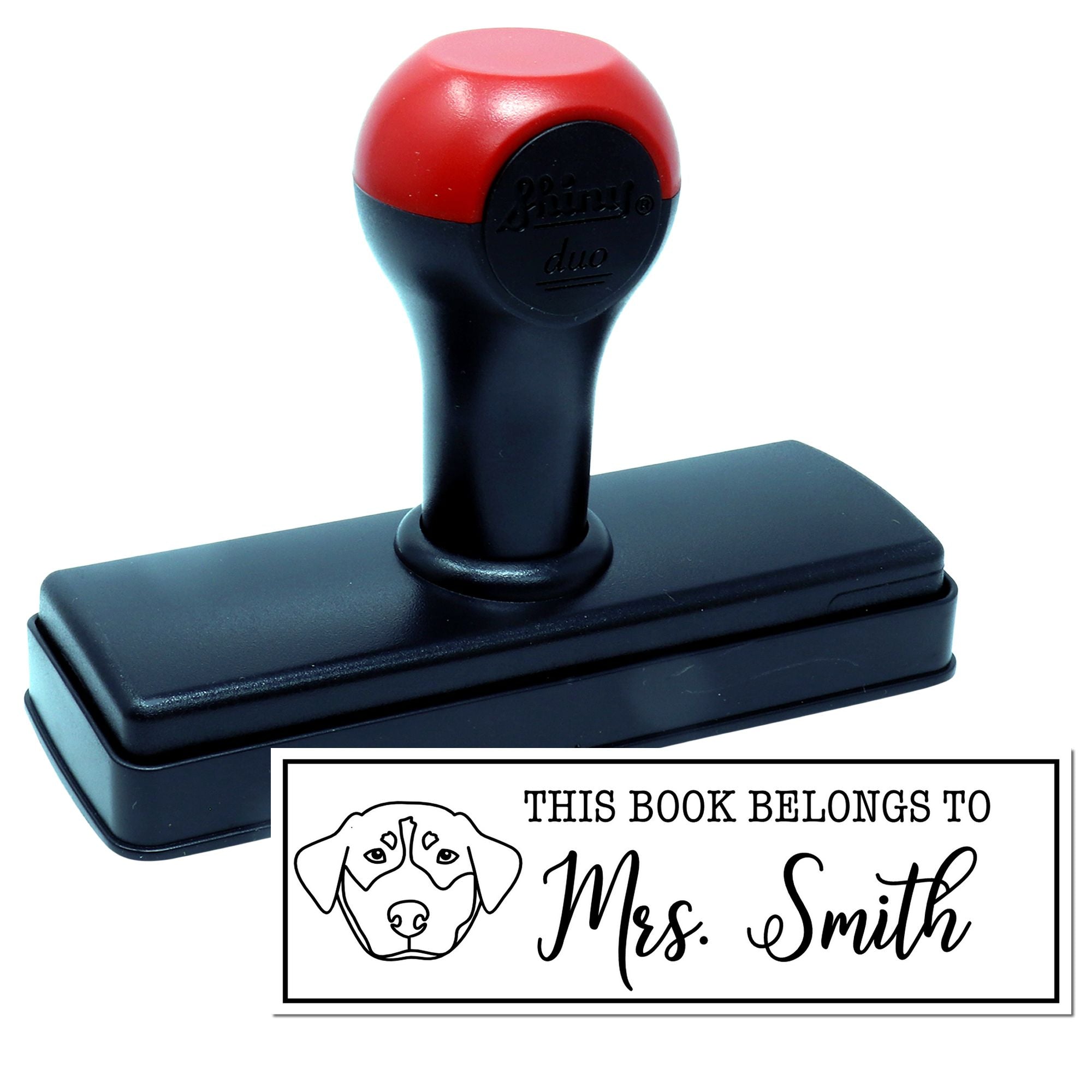 Personalized self-inking rubber book stamp with dog design, labeled This Book Belongs to Mrs. Smith.