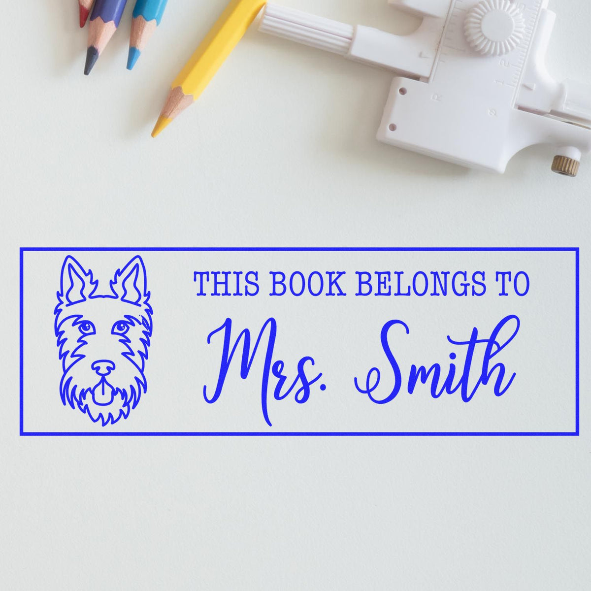 Personalized rubber book stamp with dog design for Mrs. Smith, perfect for custom library books and classroom labeling.