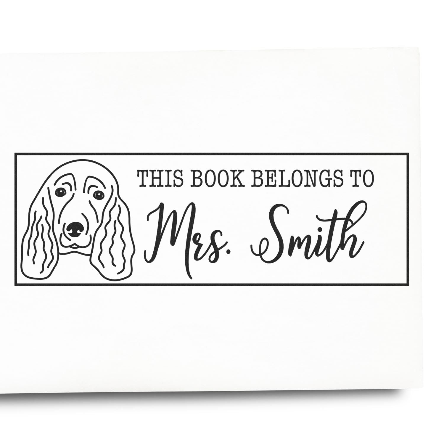 Personalized This Book Belongs to Mrs. Smith rubber stamp with dog illustration for custom library book labeling.