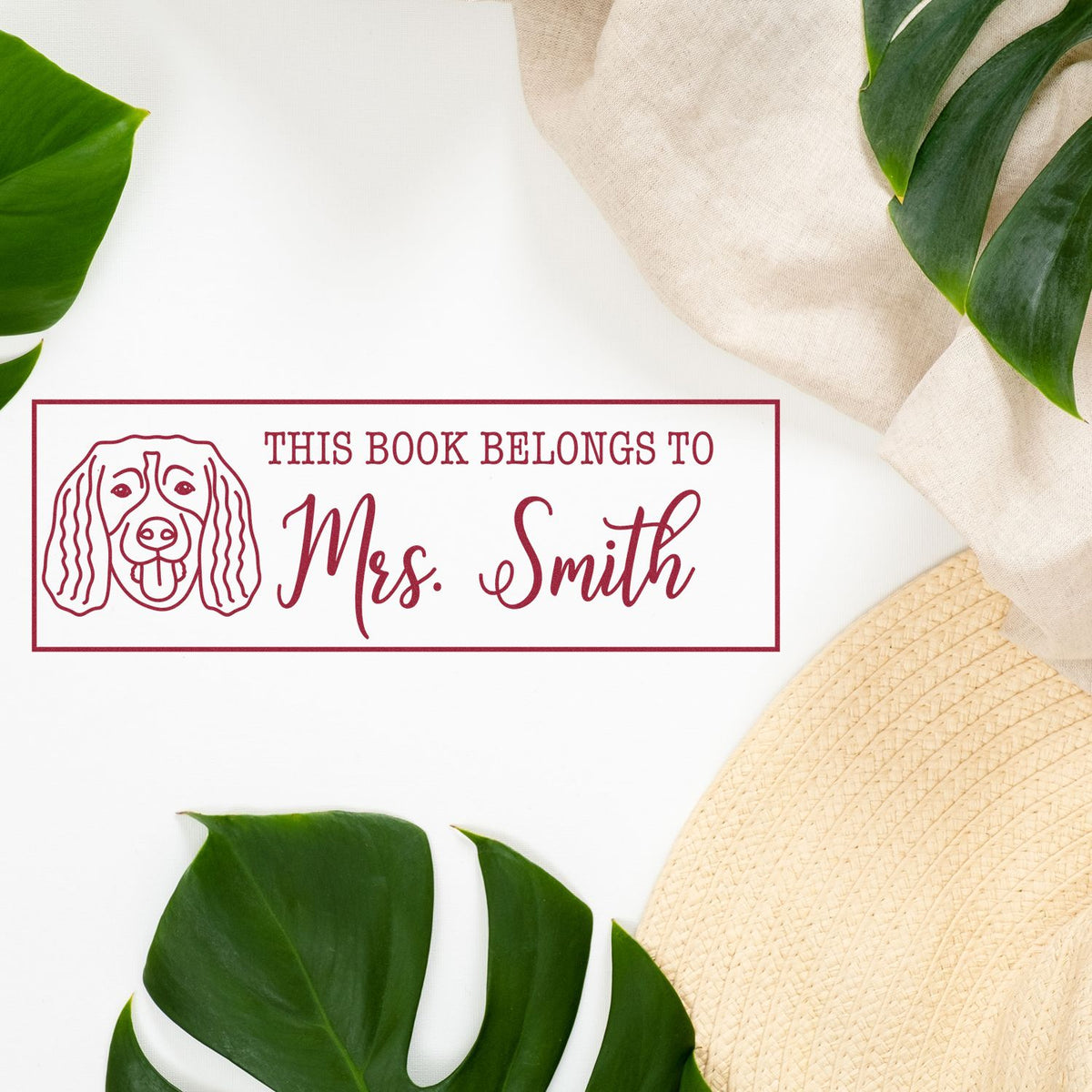 Personalized bookplate rubber stamp for Mrs. Smith with dog illustration and This Book Belongs To design.