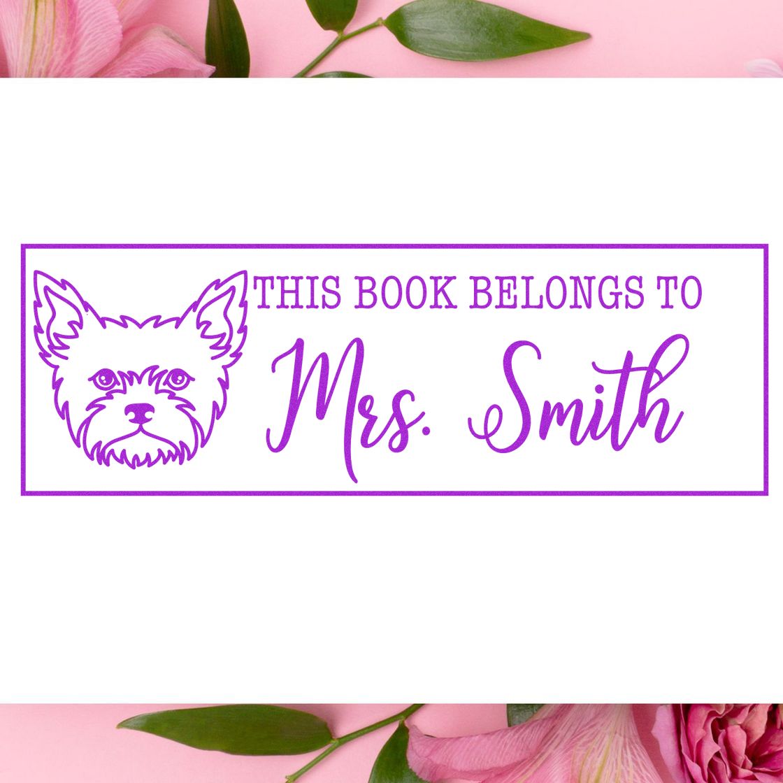 Custom rubber stamp design with dog illustration and This Book Belongs to Mrs. Smith for personal library books.