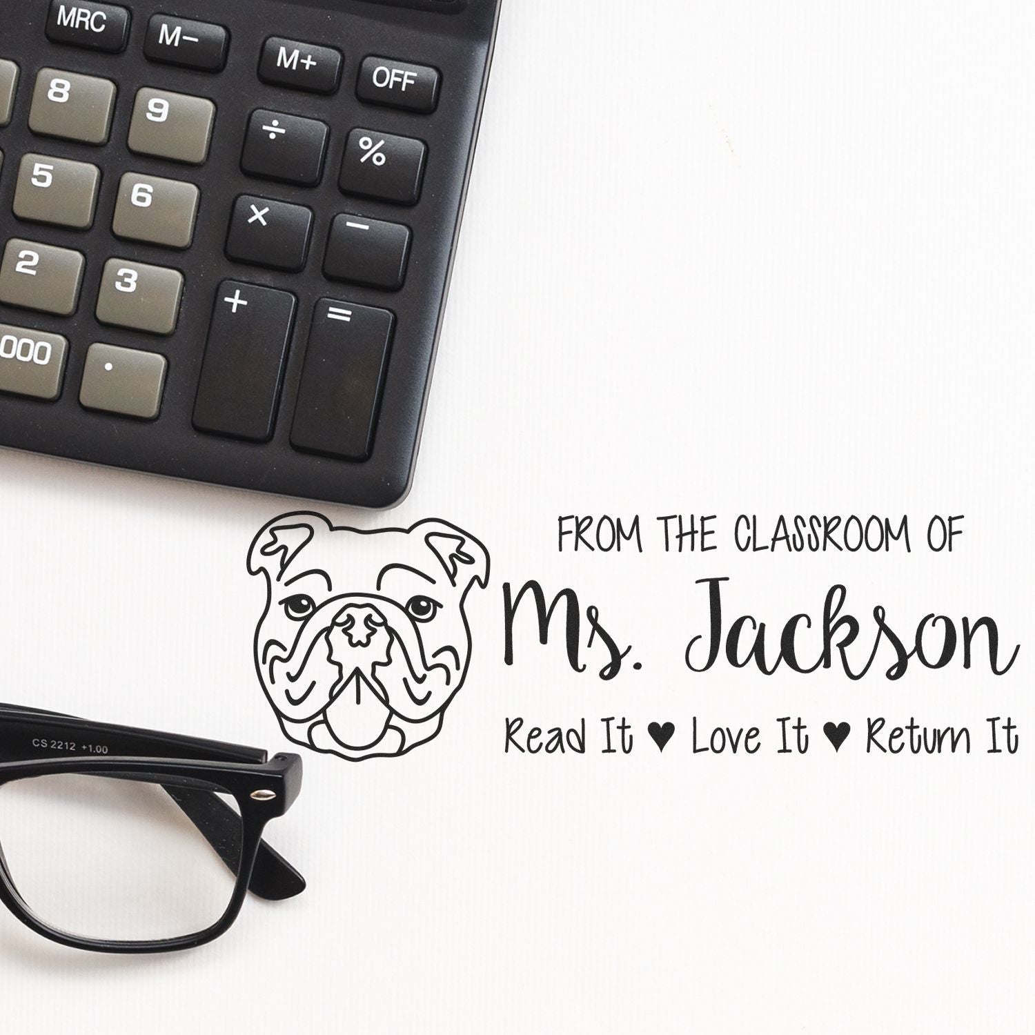 Personalized teacher rubber stamp for Ms. Jackson, featuring bulldog logo and Read It, Love It, Return It book return message.