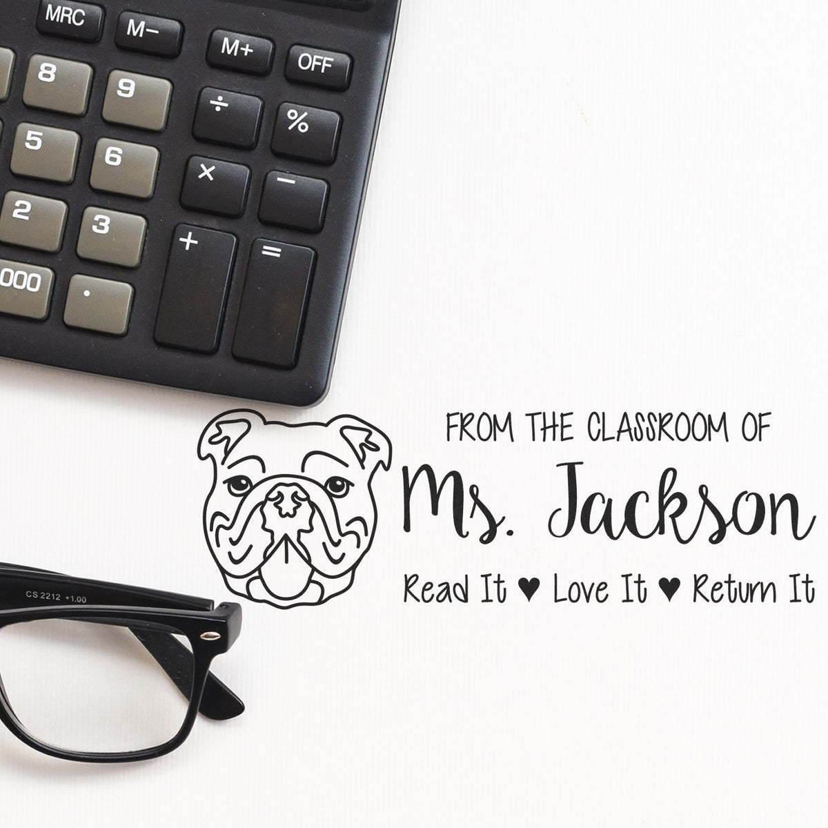 Custom classroom library rubber stamp for Mrs. Jackson: Read It, Love It, Return It with bulldog icon.