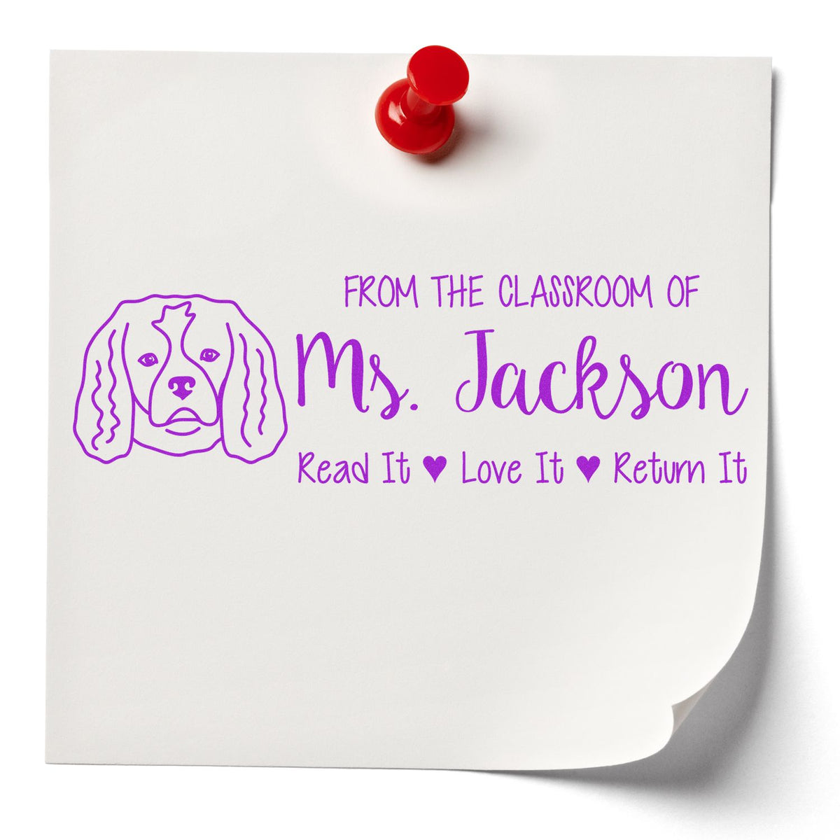 Custom classroom rubber stamp with dog illustration, Ms. Jackson name, and Read It, Love It, Return It library message.