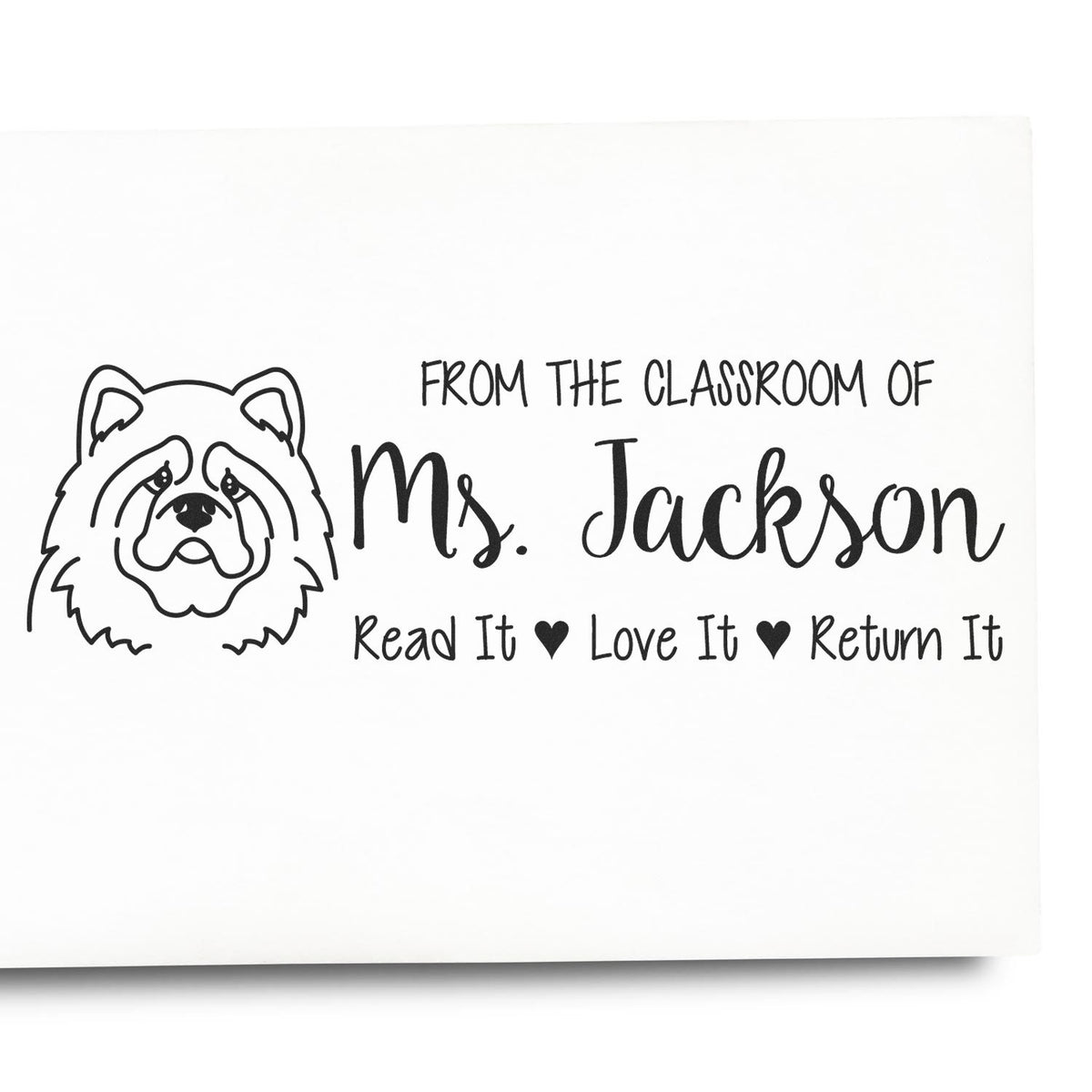 Personalized classroom rubber stamp with dog illustration and From the Classroom of Ms. Jackson, Read It Love It Return It text.