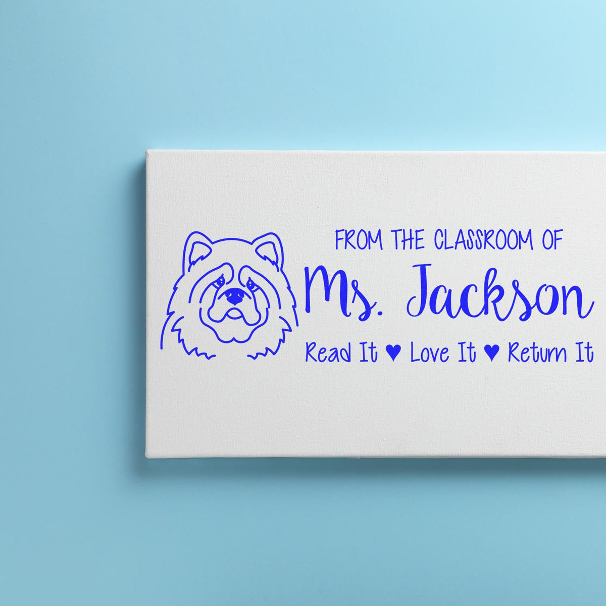 Custom classroom rubber stamp for Ms. Jackson, featuring a bear logo and Read It, Love It, Return It book label text.
