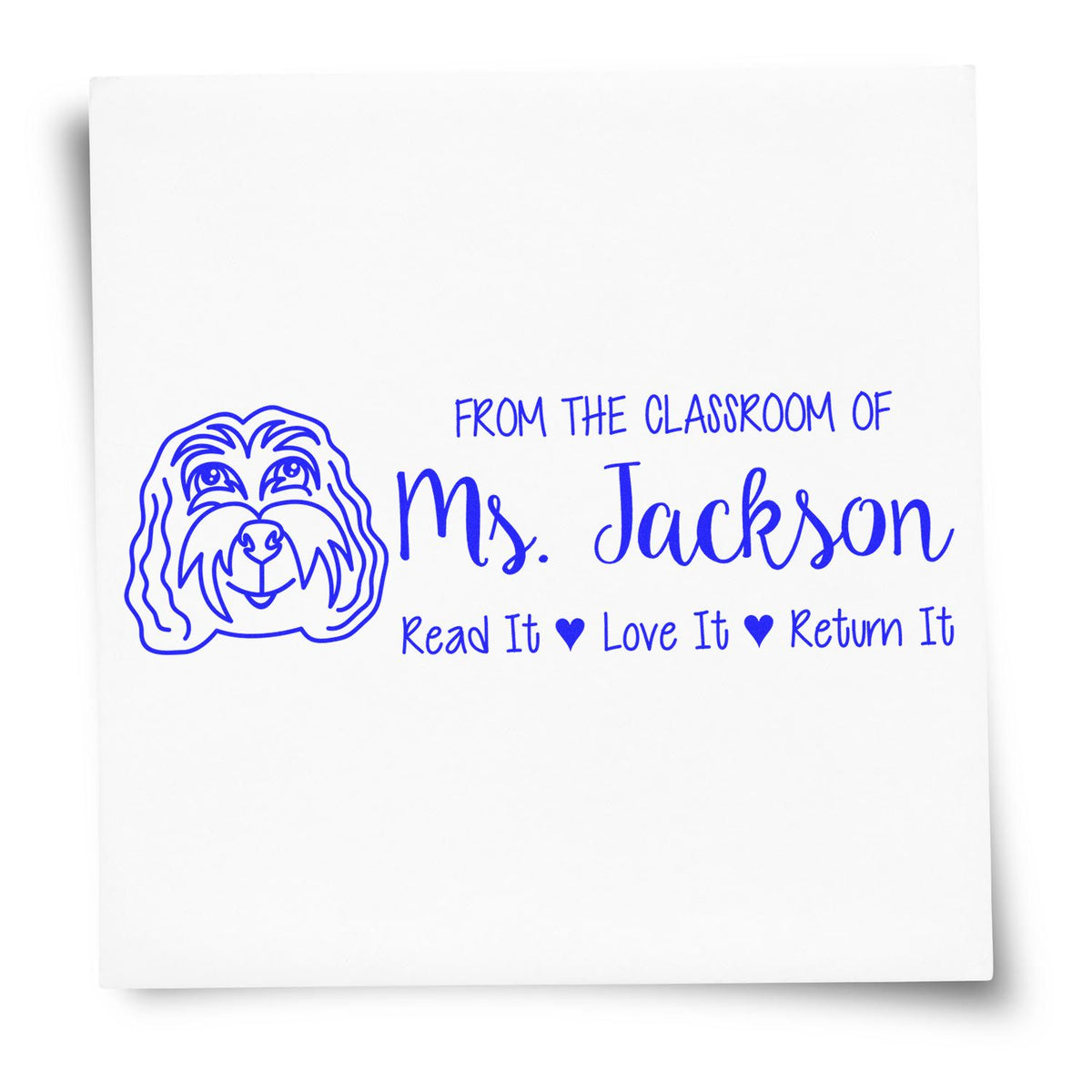 Custom teacher rubber stamp with dog design, From the Classroom of Ms. Jackson, Read It Love It Return It text.