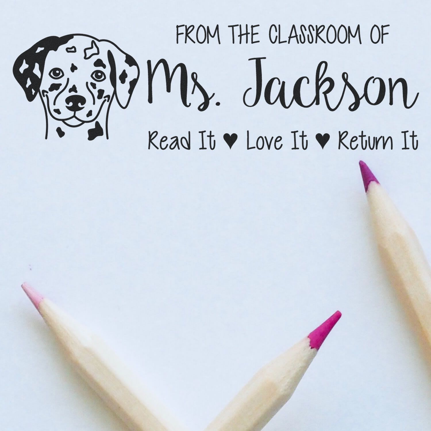 Personalized teacher rubber stamp with dog design, Ms. Jackson classroom name, and Read It, Love It, Return It message.