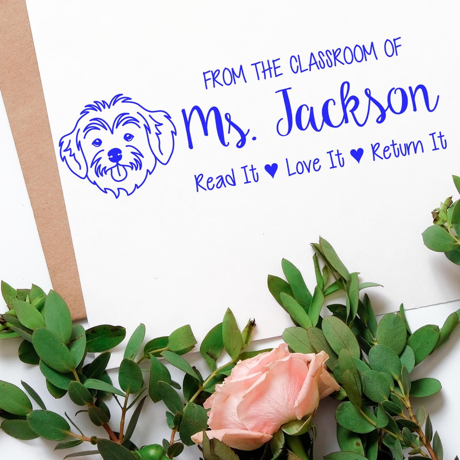 Custom teacher rubber stamp for Ms. Jackson with dog logo and Read it, love it, return it classroom book label.