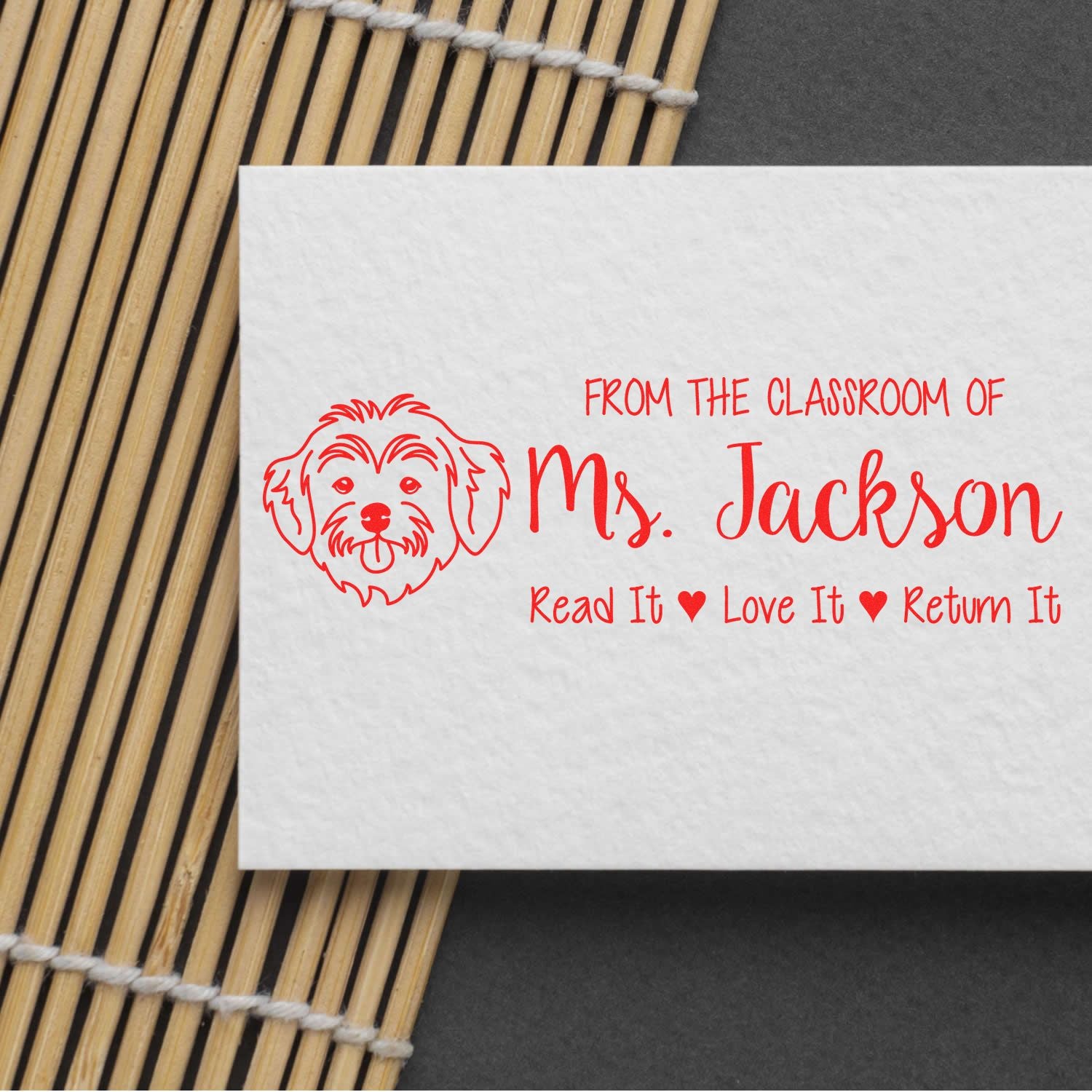 Custom classroom rubber stamp with dog design: From the classroom of Ms. Jackson, Read It Love It, Return It.
