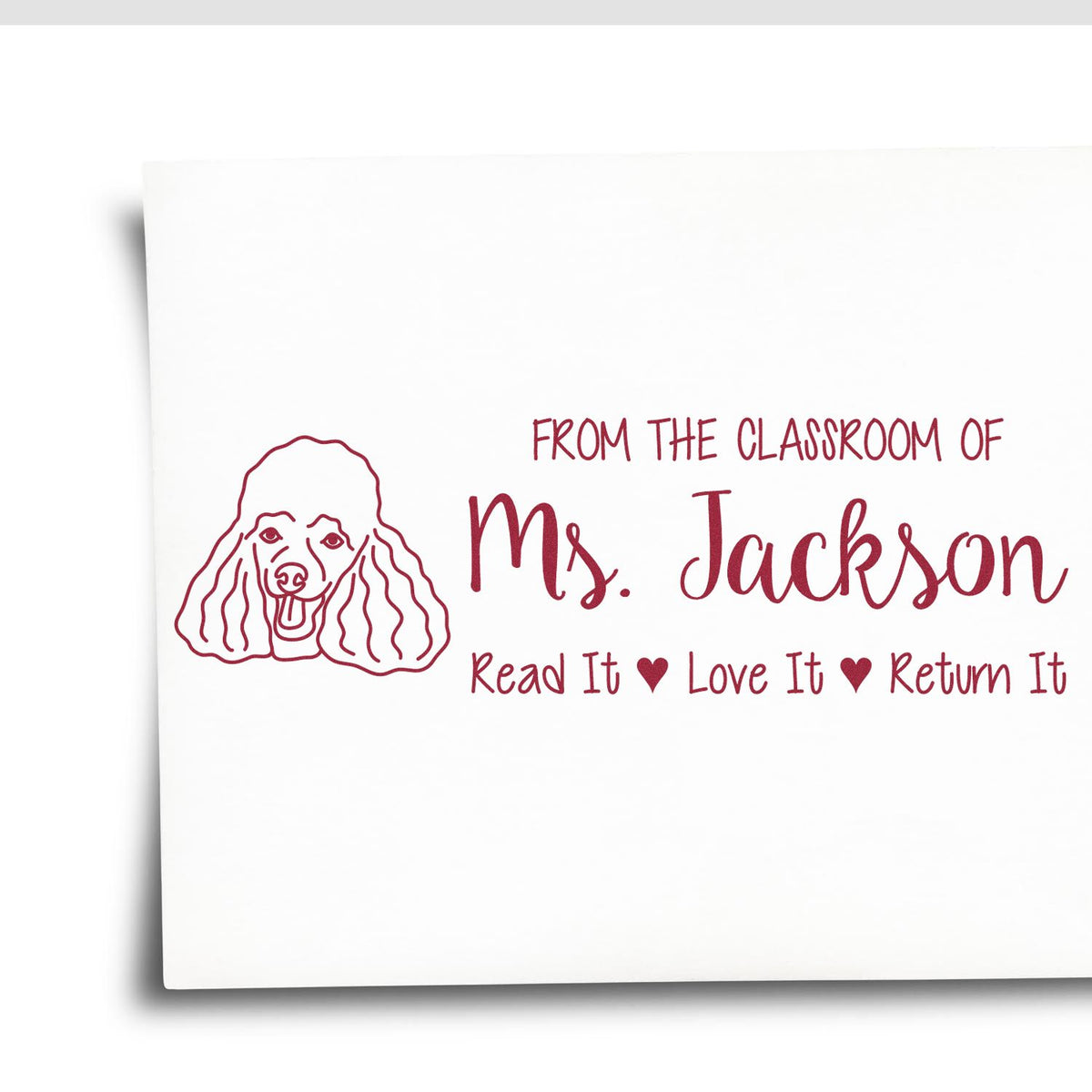 Custom teacher rubber stamp for Ms. Jackson with poodle design and Read It Love It Return It book label.