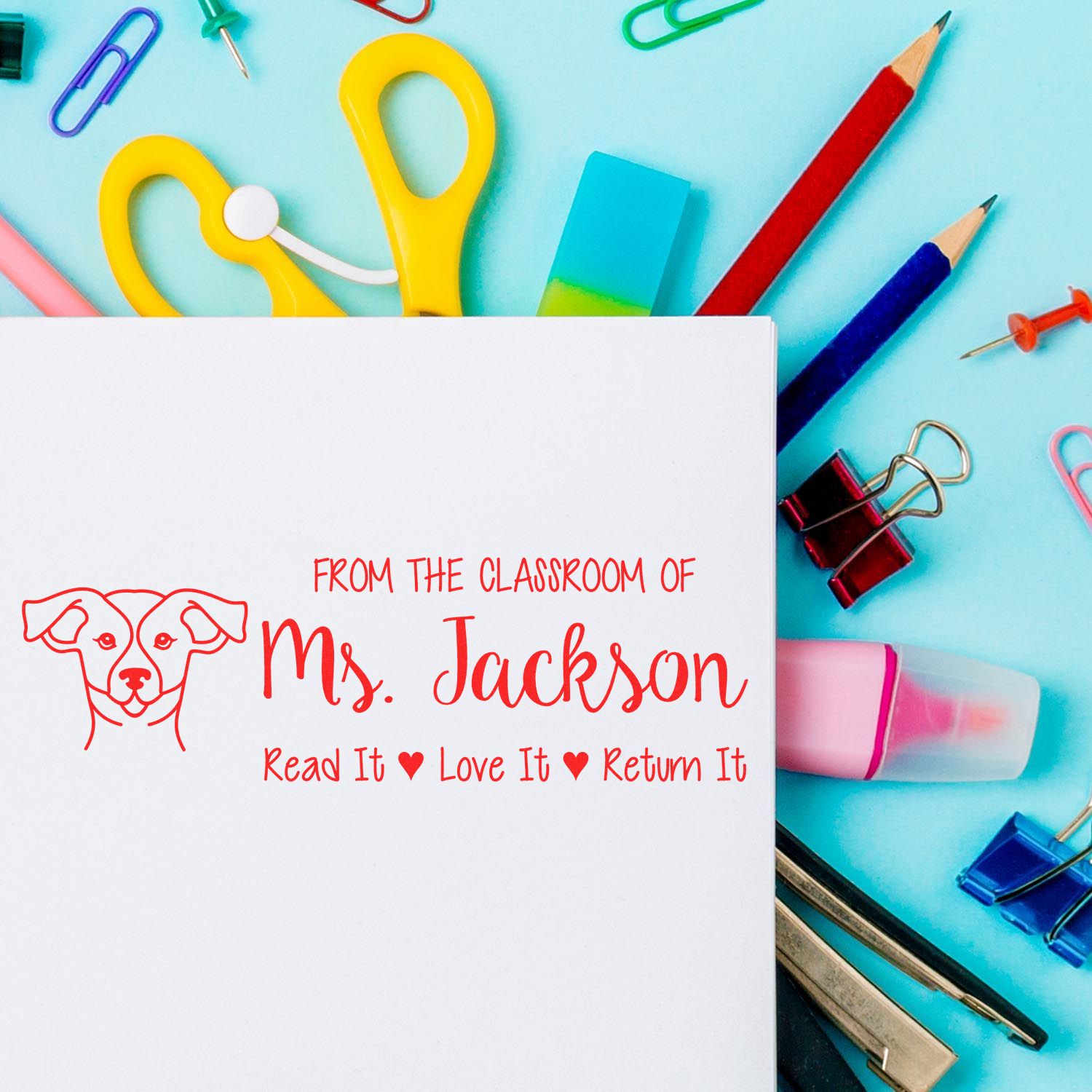 Custom teacher rubber stamp for Ms. Jackson with dog icon and Read It, Love It, Return It classroom book label.