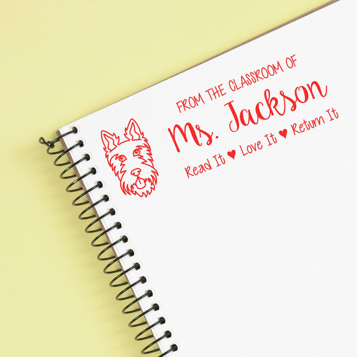 Custom teacher rubber stamp for classroom books, reading Ms. Jackson with Read It, Love It, Return It and dog design.