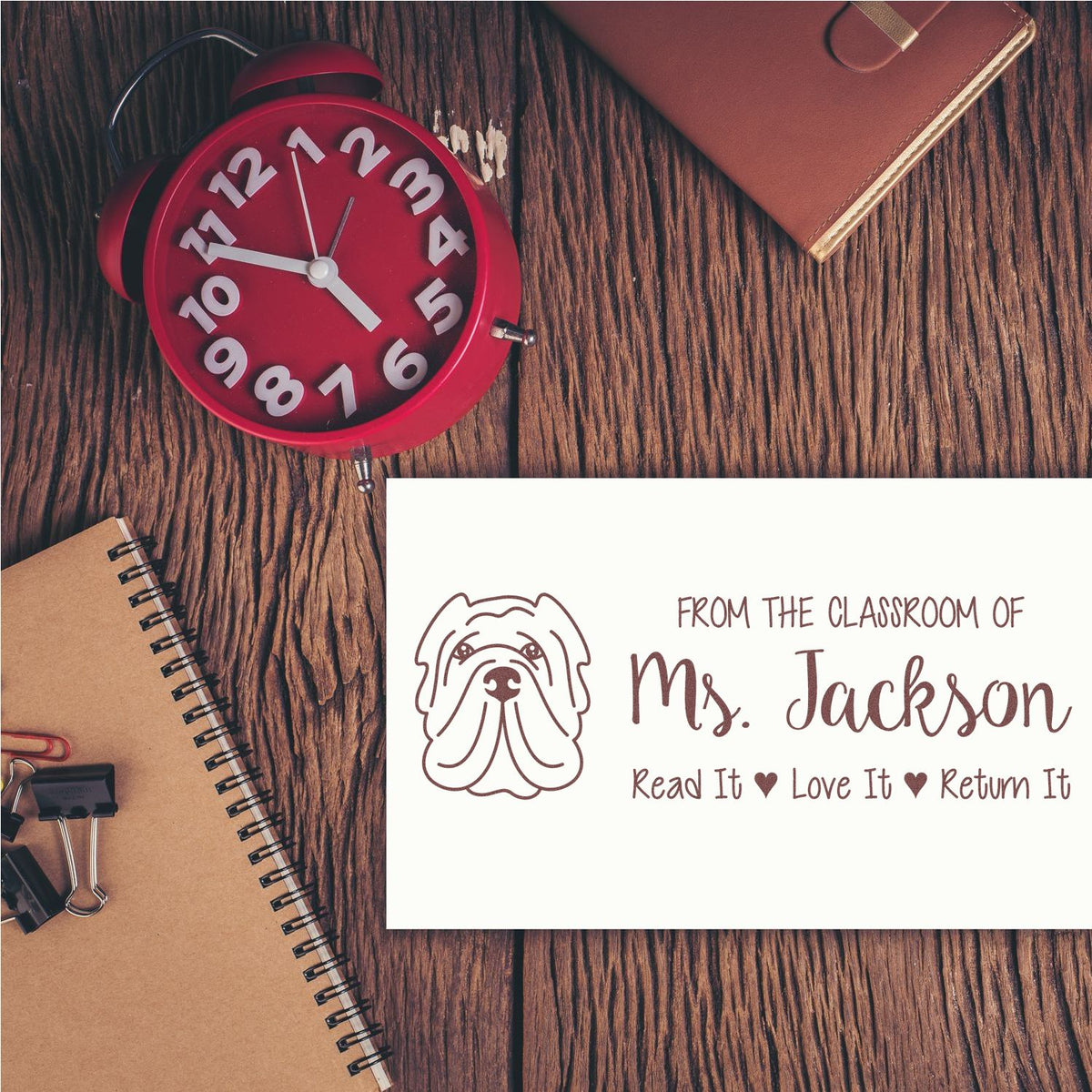 Personalized teacher rubber stamp with dog logo and Read It, Love It, Return It message for Ms. Jackson classroom use.