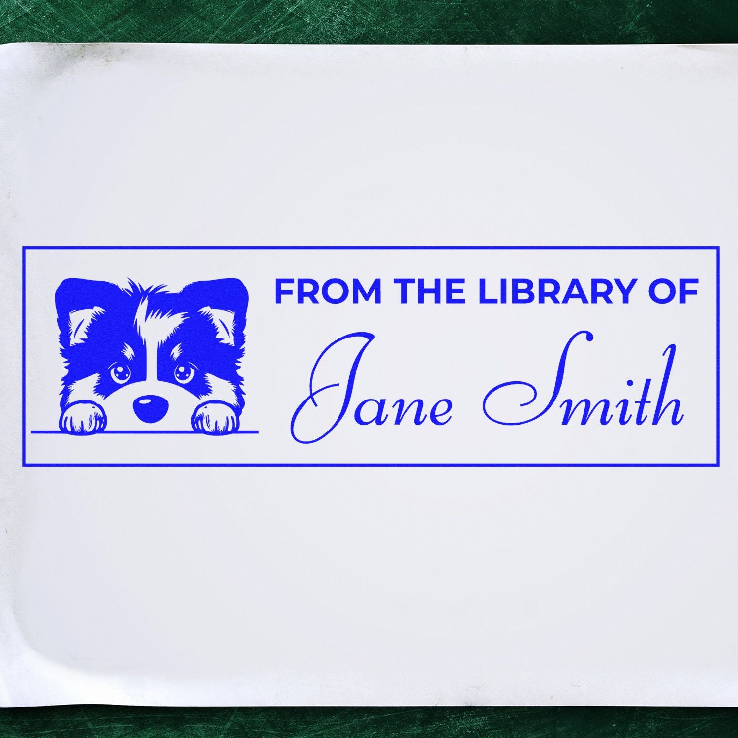 Personalized library rubber stamp with dog illustration and From the Library of Jane Smith text.