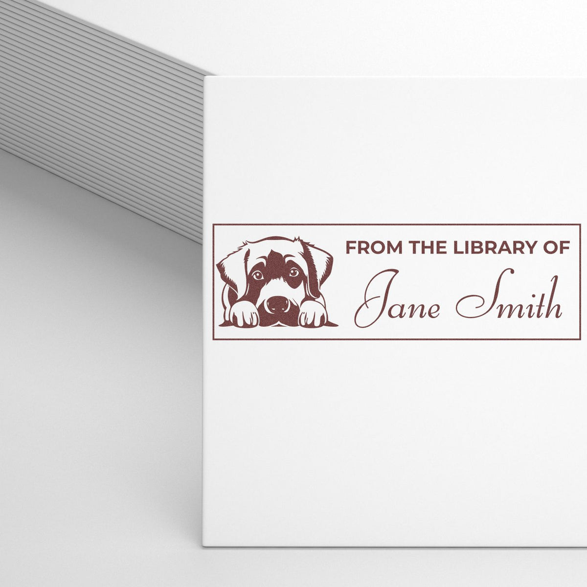 Custom rubber stamp library bookplate with dog illustration and Jane Smith name for personalizing books.