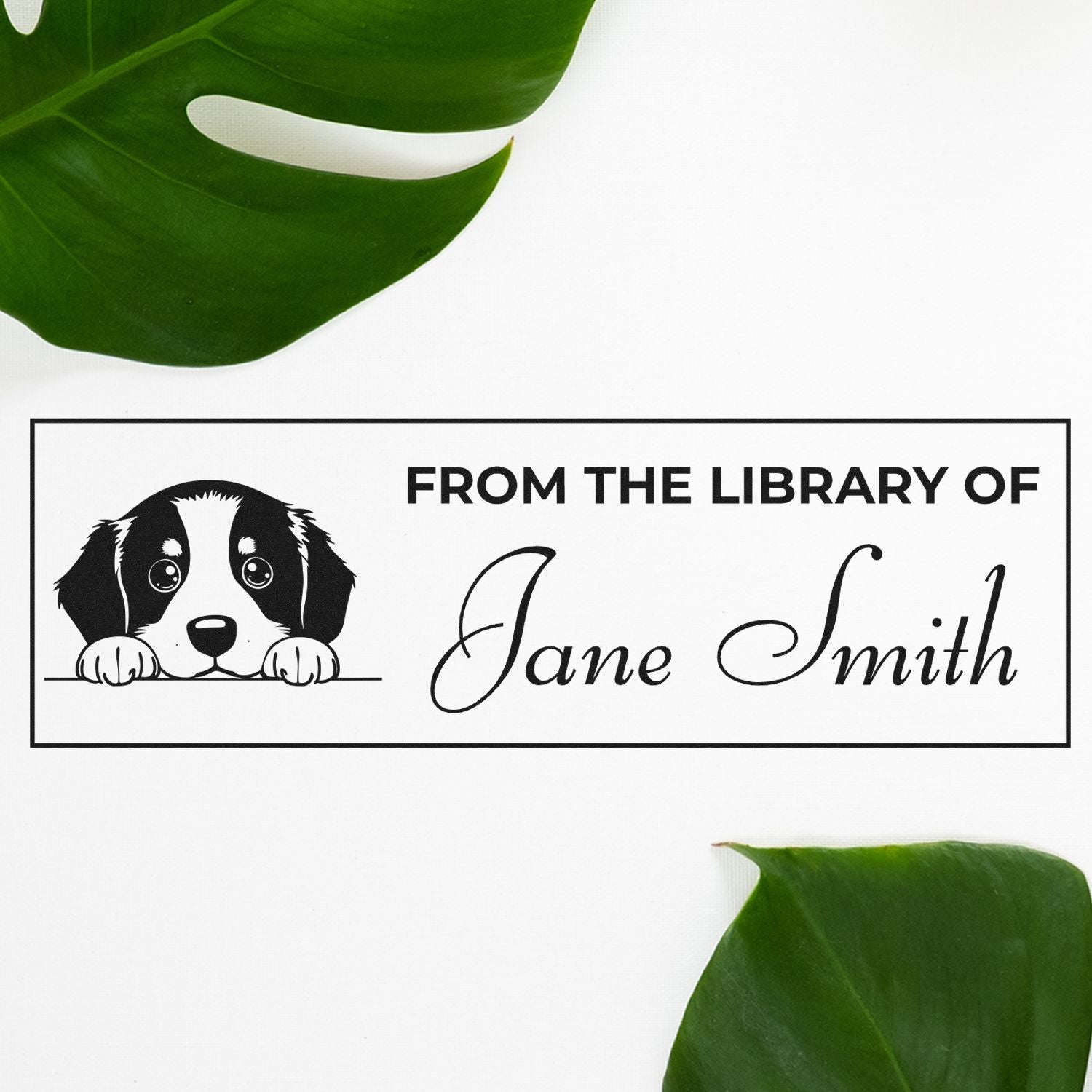 Personalized rubber stamp with puppy illustration and From the Library of Jane Smith custom bookplate design.