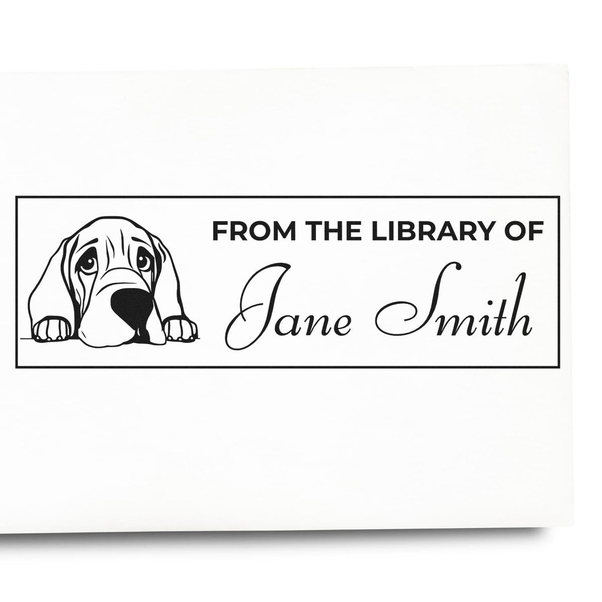 Personalized library rubber stamp with dog illustration and From the Library of Jane Smith text for book ownership