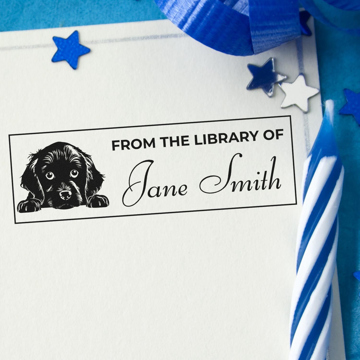 Custom library rubber stamp with dog illustration and personalized From the Library of Jane Smith name design.