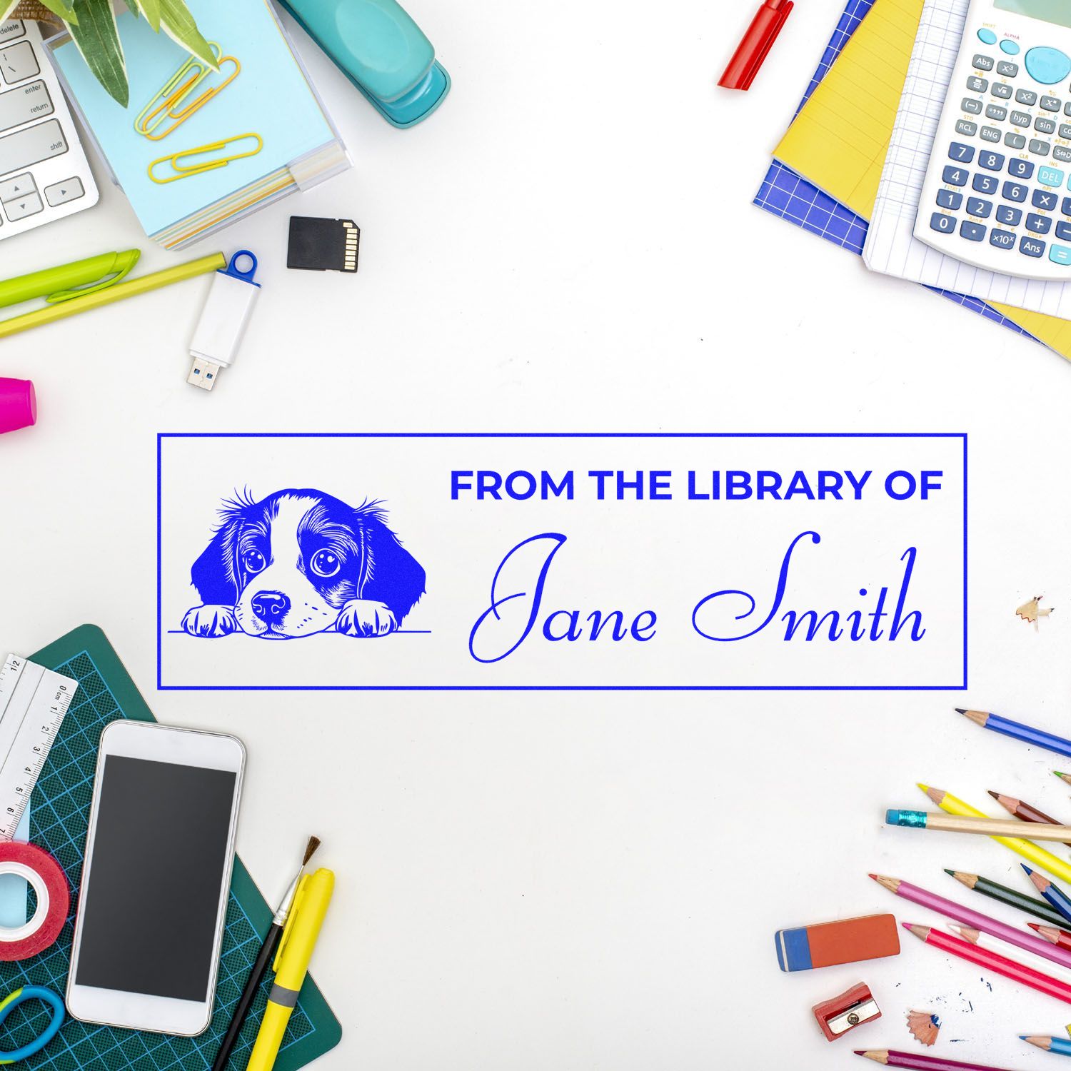 Custom rubber library stamp with dog illustration and From the Library of Jane Smith for personalized book labeling.
