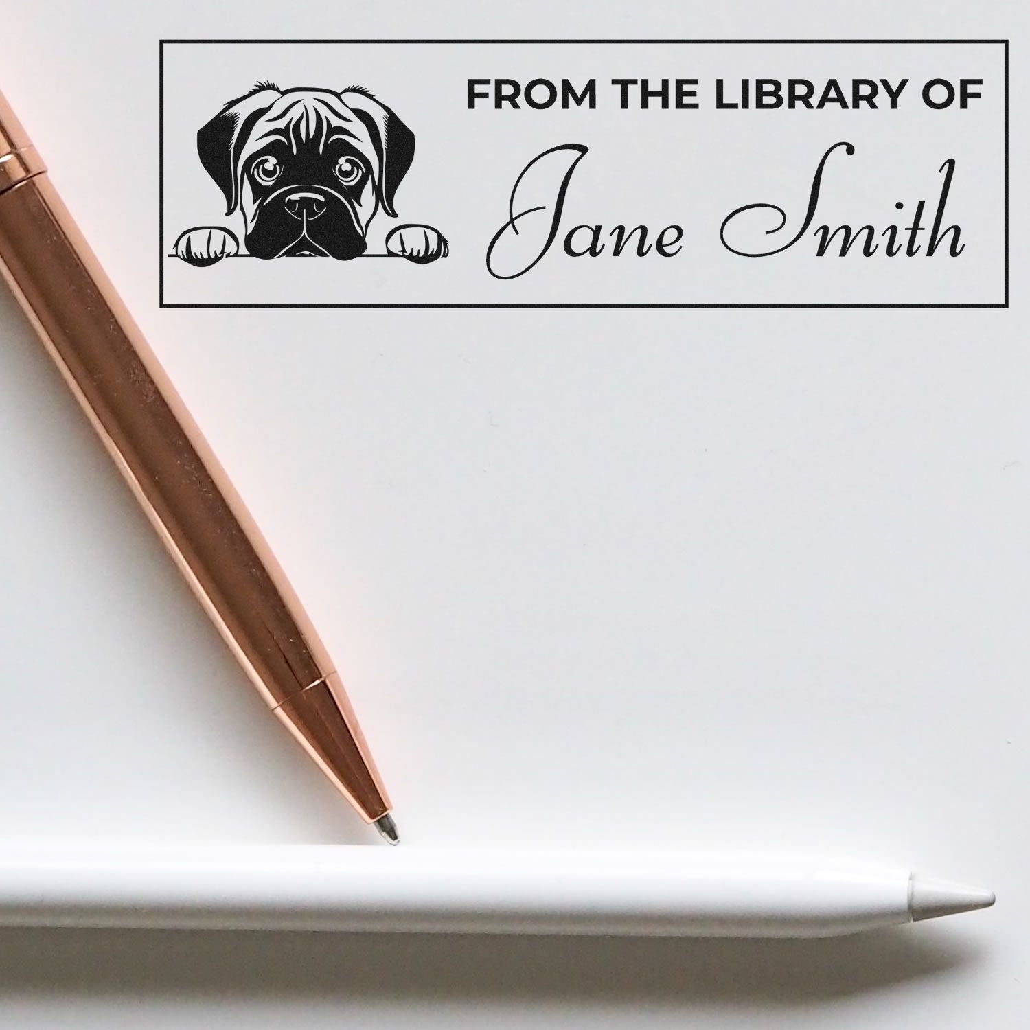 Personalized dog library rubber stamp reading From the Library of Jane Smith for custom book ownership marking.