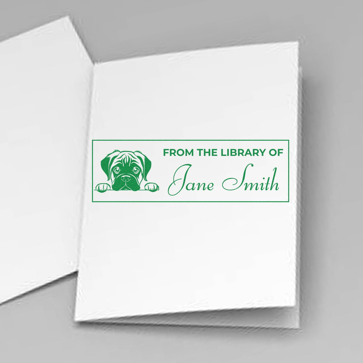 Personalized rubber stamp for books with dog design, reading From the Library of Jane Smith for custom bookplate marking.