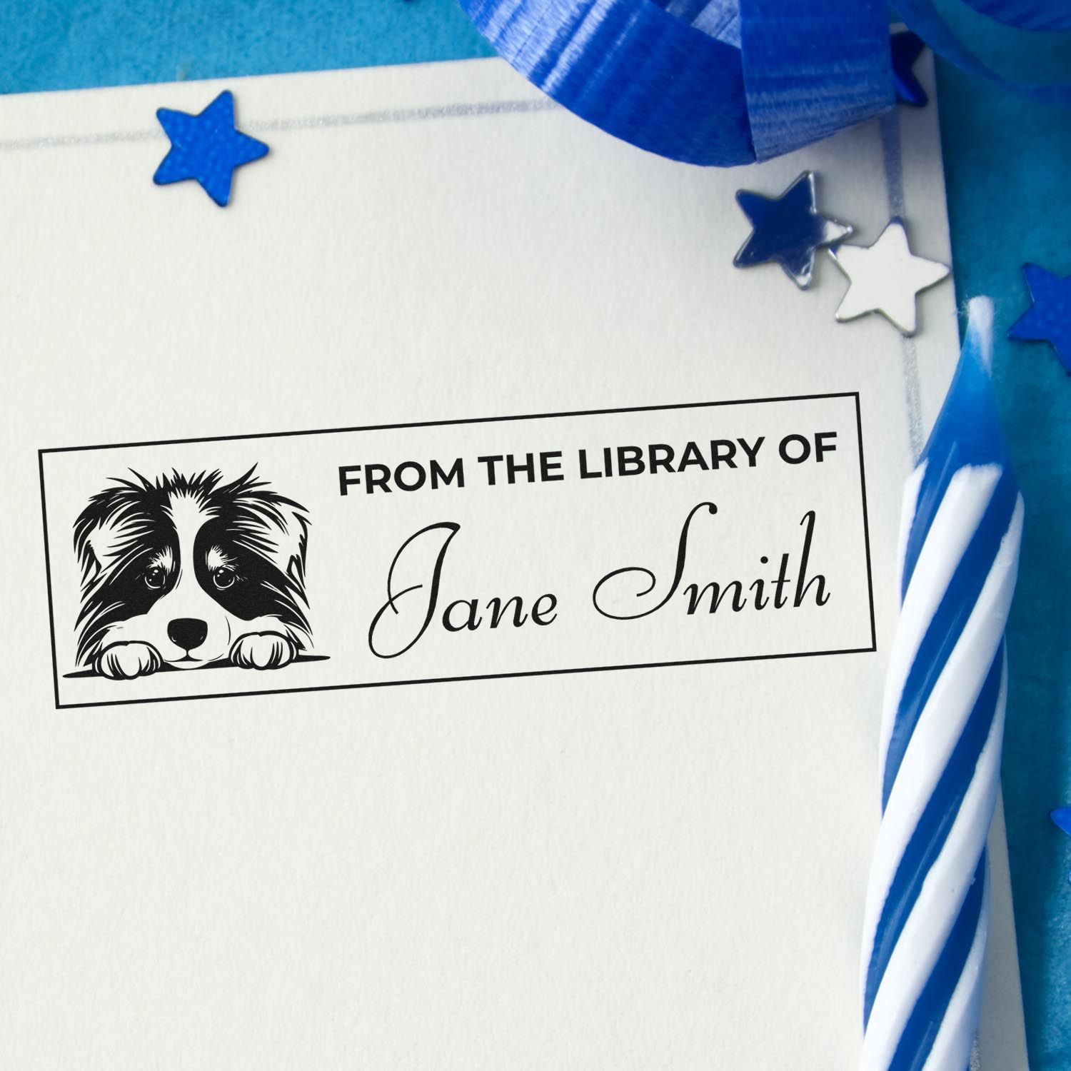 Custom library rubber stamp with dog illustration and personalized From the Library of Jane Smith book label.