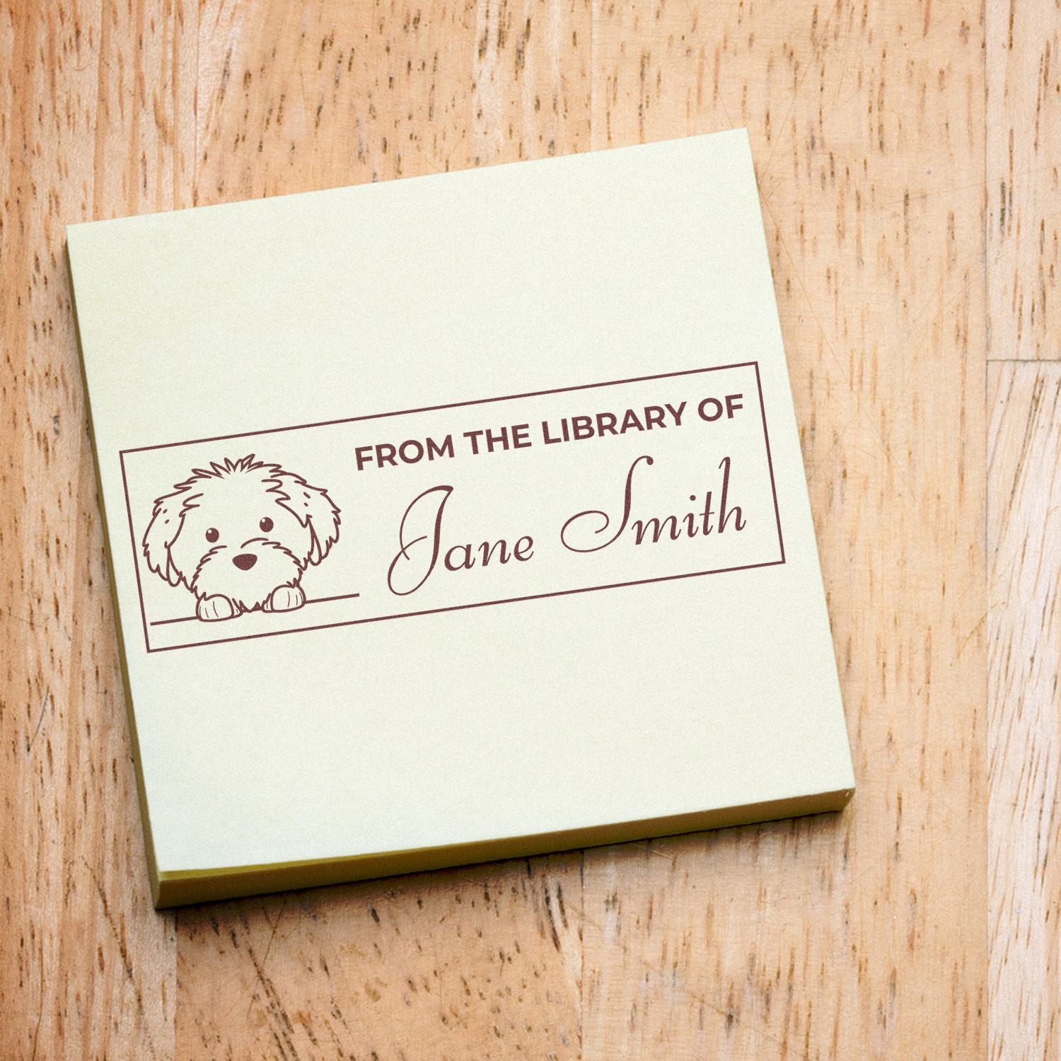 Personalized rubber stamp for books with dog illustration and From the Library of Jane Smith custom library name design.