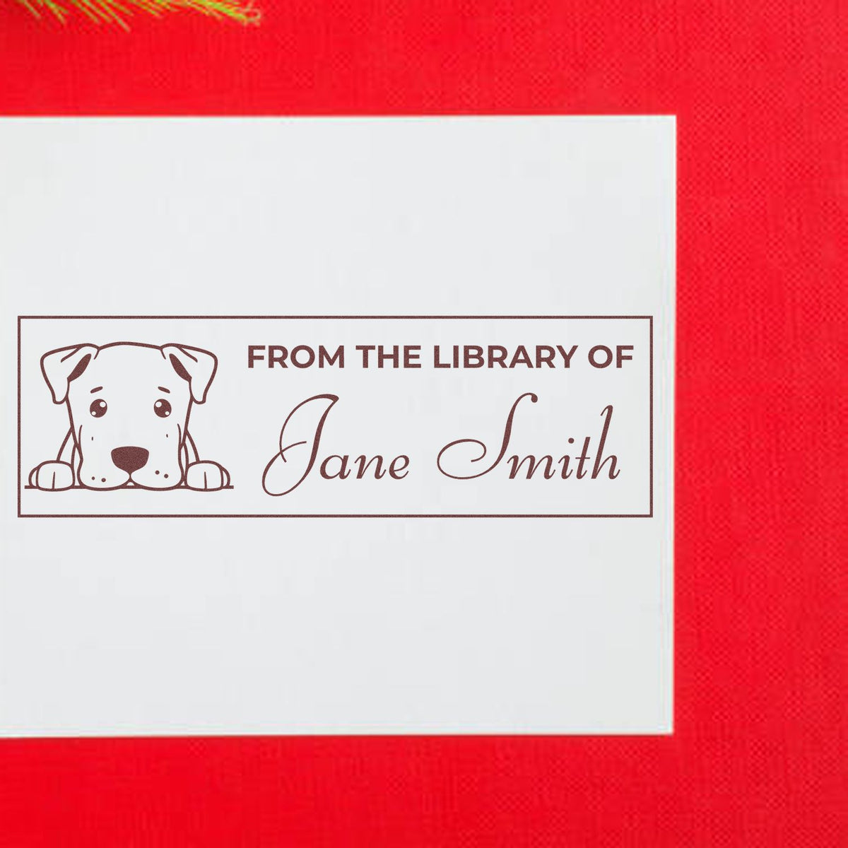 Personalized rubber book stamp with dog illustration and From the Library of Jane Smith custom name design
