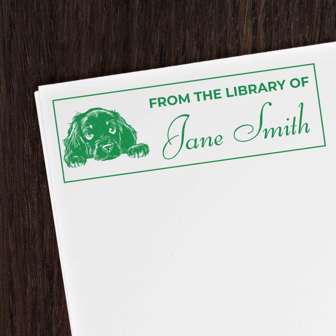 Personalized library book stamp with dog illustration and Jane Smith name for custom book labeling and rubber stamping.