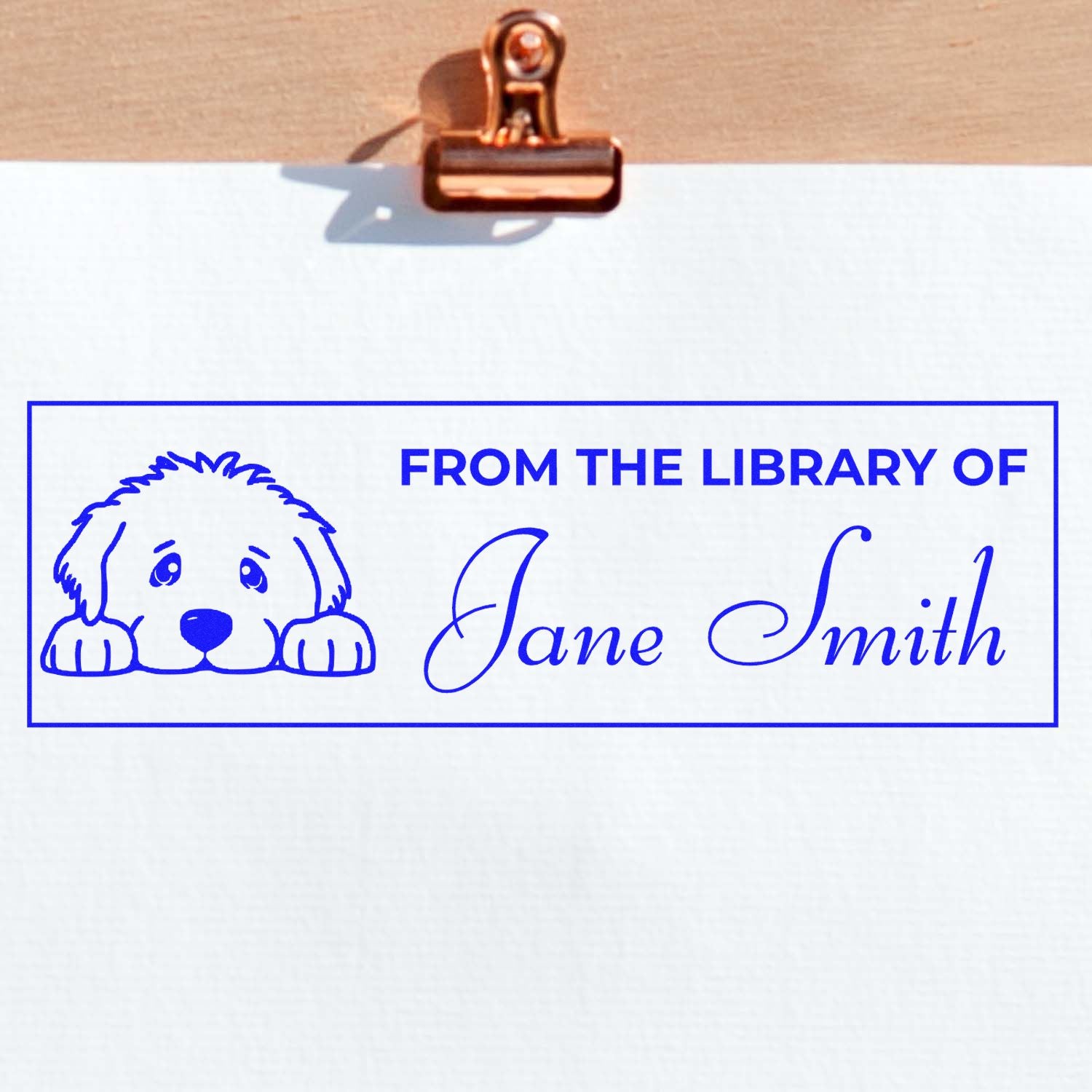 Custom rubber library stamp with dog illustration and From the Library of Jane Smith personalized bookplate text.