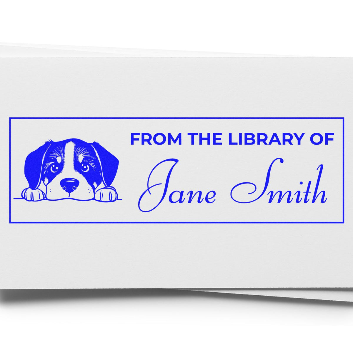 Custom dog-themed rubber stamp for books, reading From the Library of Jane Smith with puppy illustration.