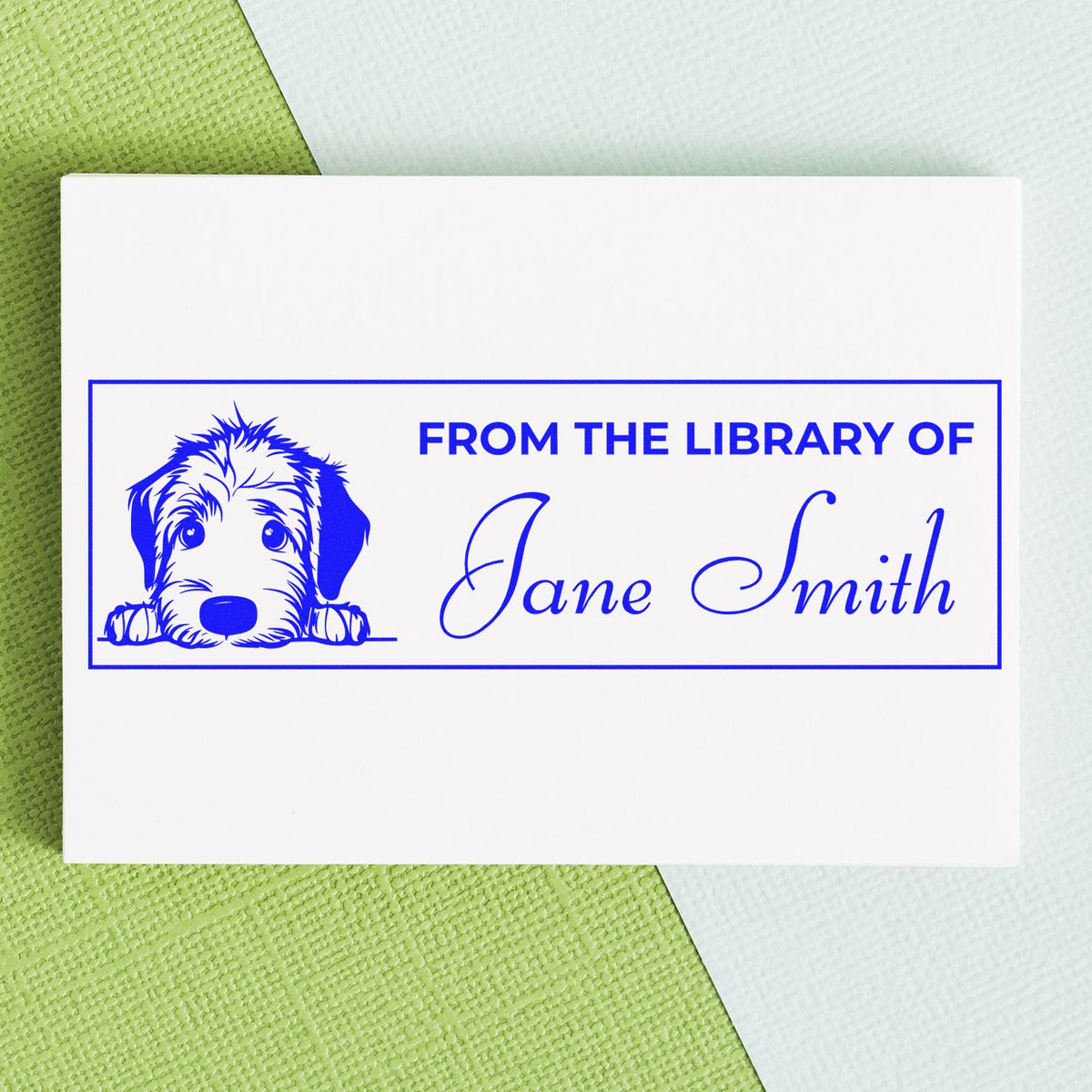 Personalized dog library rubber stamp reading From the Library of Jane Smith for custom book labels.