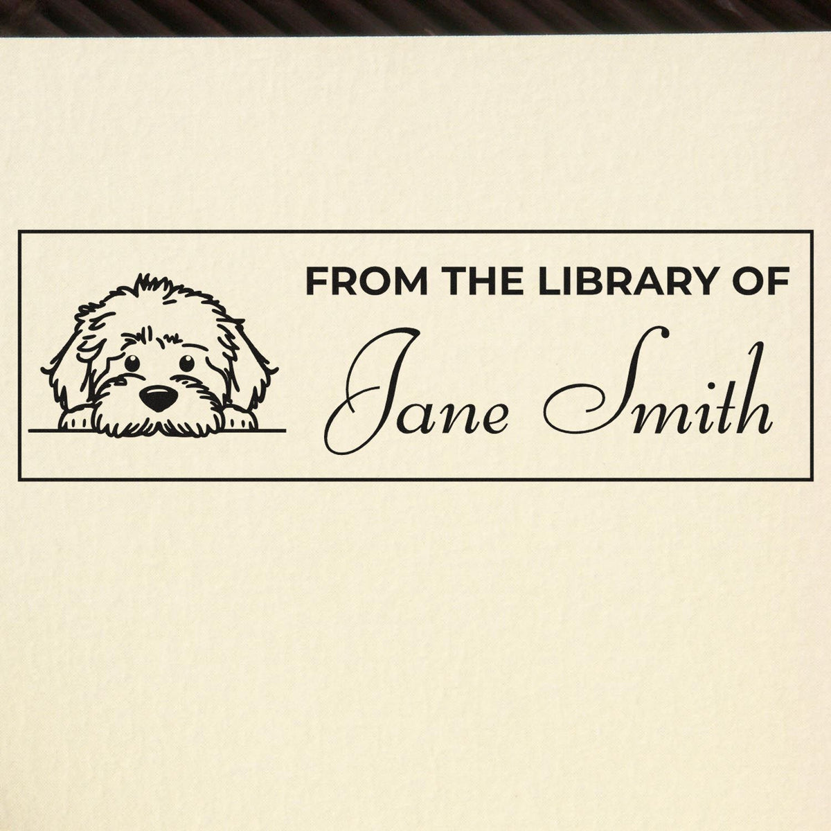 Custom dog library stamp reading From the Library of Jane Smith for personalized ex libris book labeling.