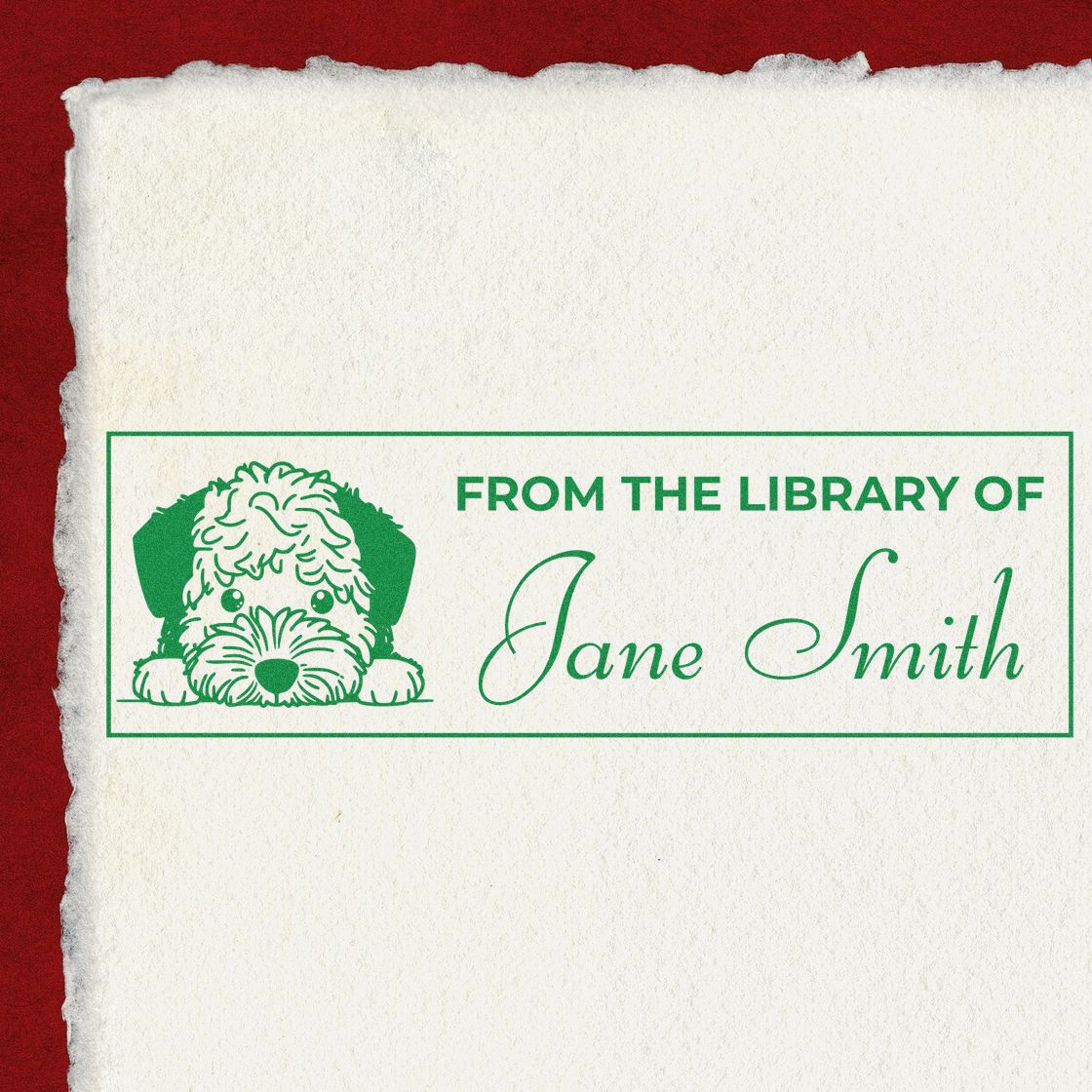 Custom library rubber stamp with dog design, reading From the Library of Jane Smith for personal book labeling.