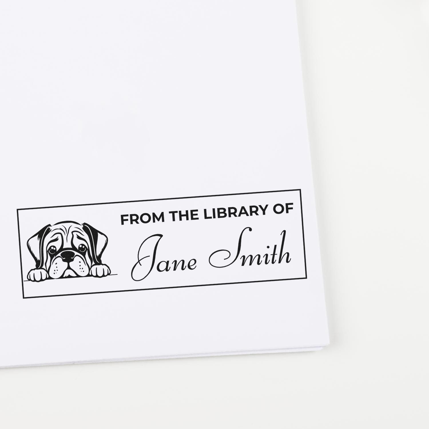 Custom personalized library rubber stamp with dog illustration and From the Library of Jane Smith bookplate text.