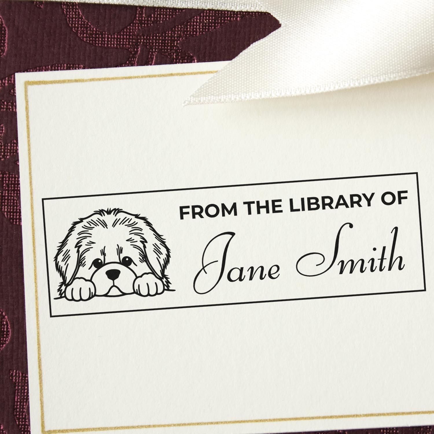 Custom dog library rubber stamp reading From the Library of Jane Smith for personalized bookplates and stationery.