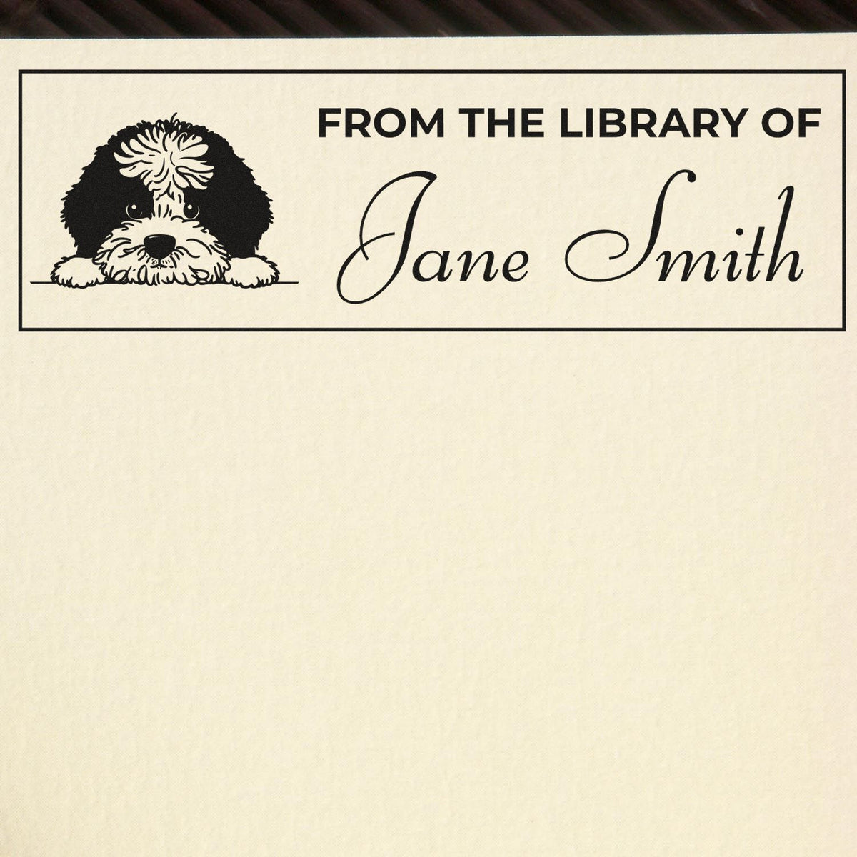 Custom library rubber stamp with dog illustration and From the Library of Jane Smith personalized name stamp.