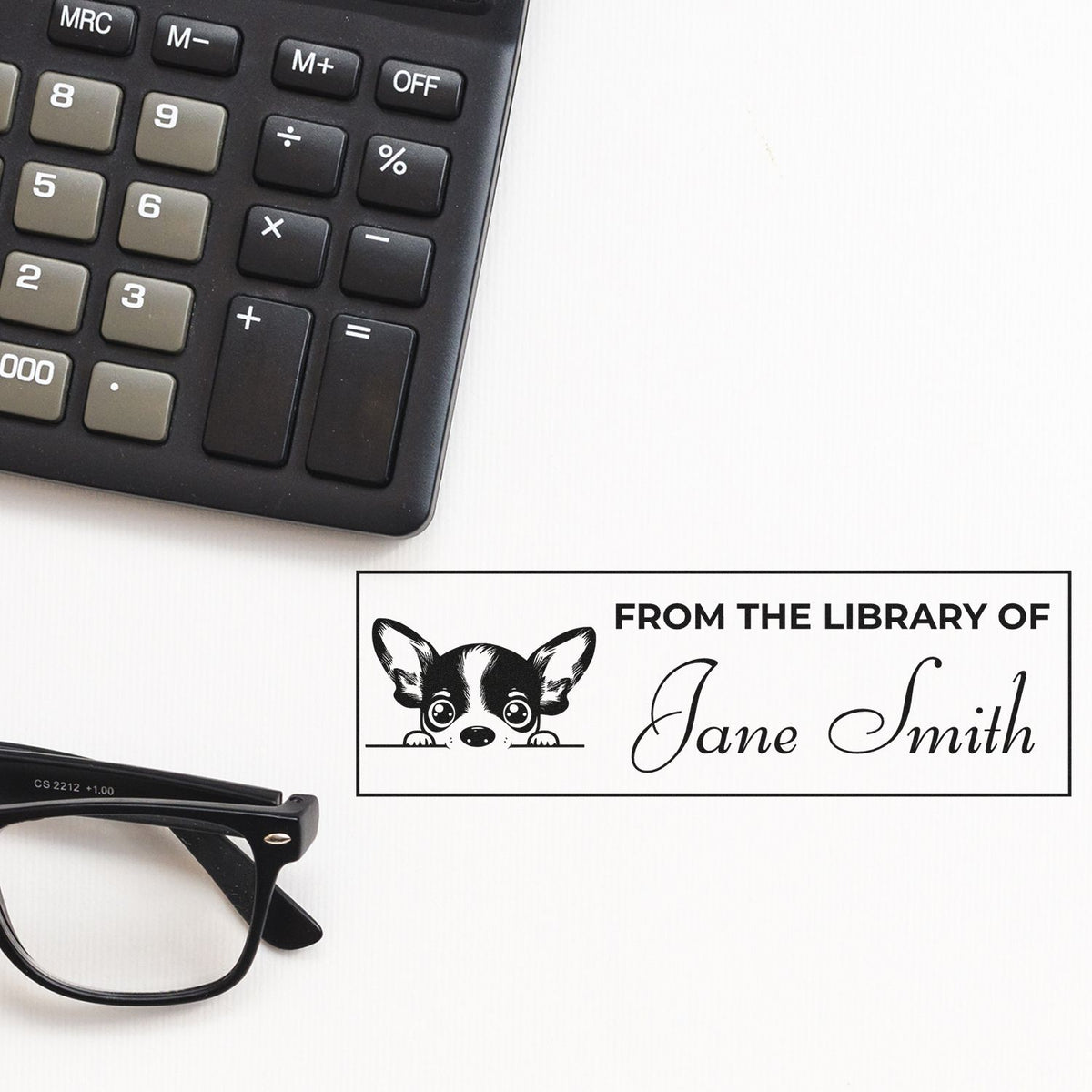 Personalized library rubber stamp with dog design and From the Library of Jane Smith for custom book ownership.