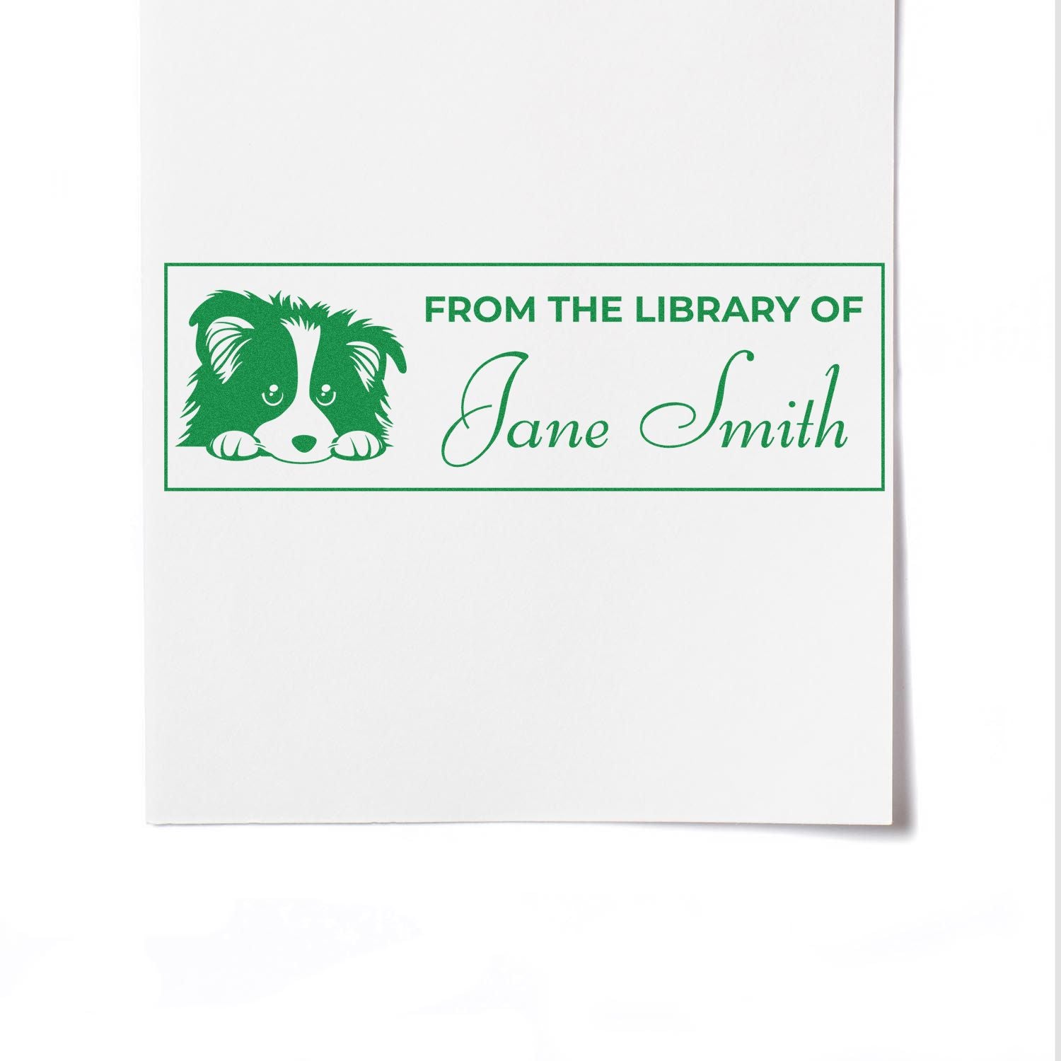 Personalized rubber stamp with dog illustration and From the Library of Jane Smith for custom book ownership marking.
