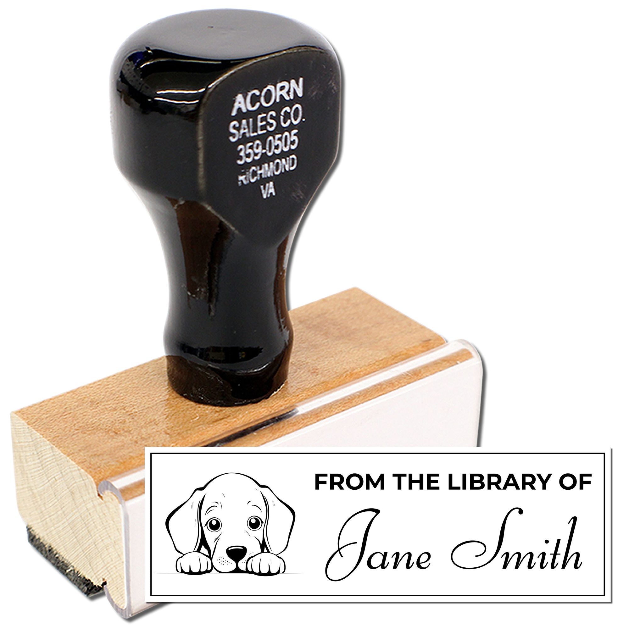 Custom rubber library stamp with dog design and From the Library of Jane Smith text on a wooden handle stamp.
