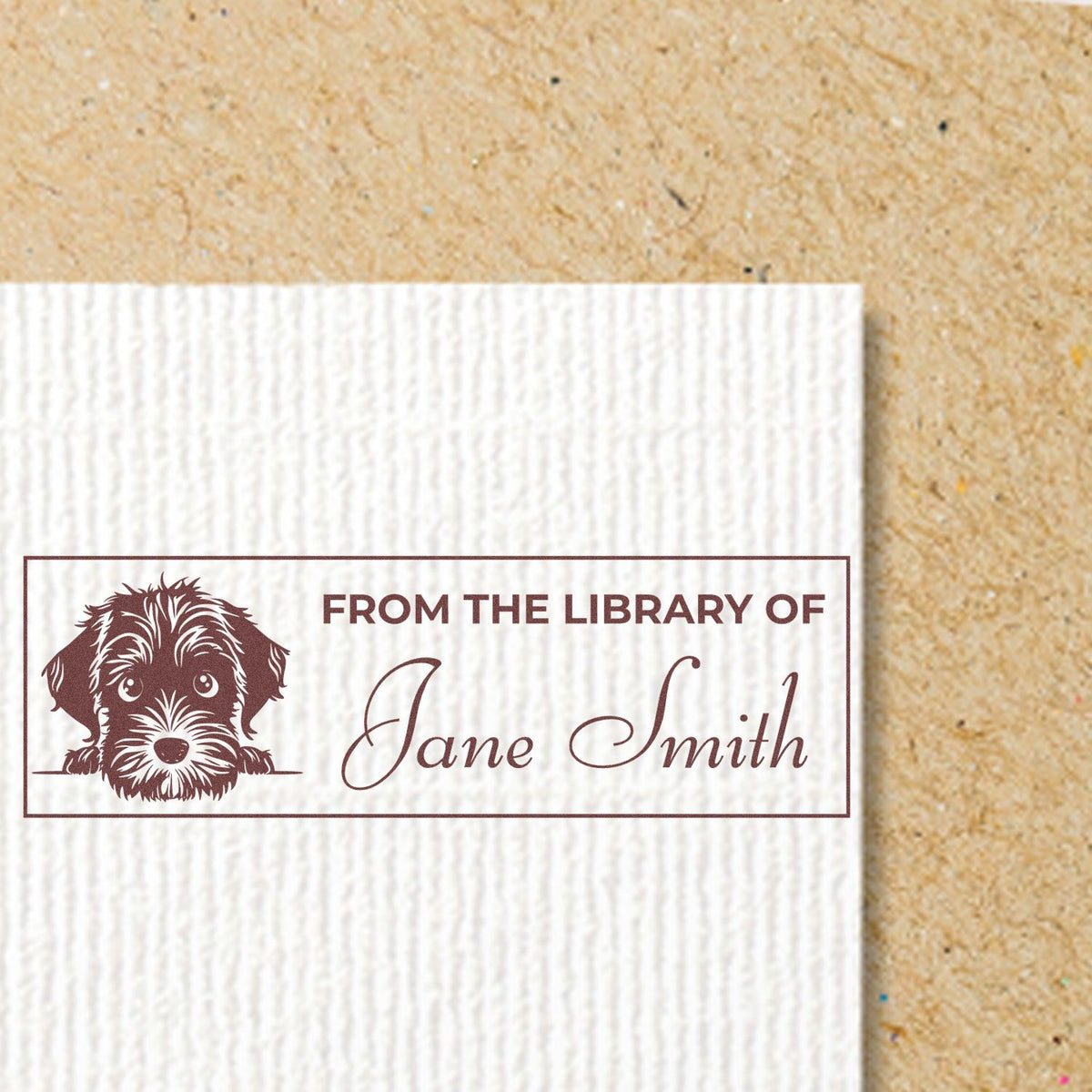 Custom rubber stamp with dog illustration and From the Library of Jane Smith personalized bookplate design for books.