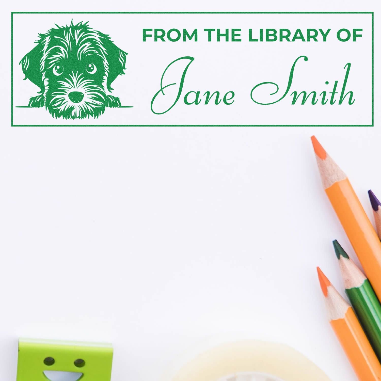 Custom rubber library stamp reading From the Library of Jane Smith with dog illustration for personalized books.