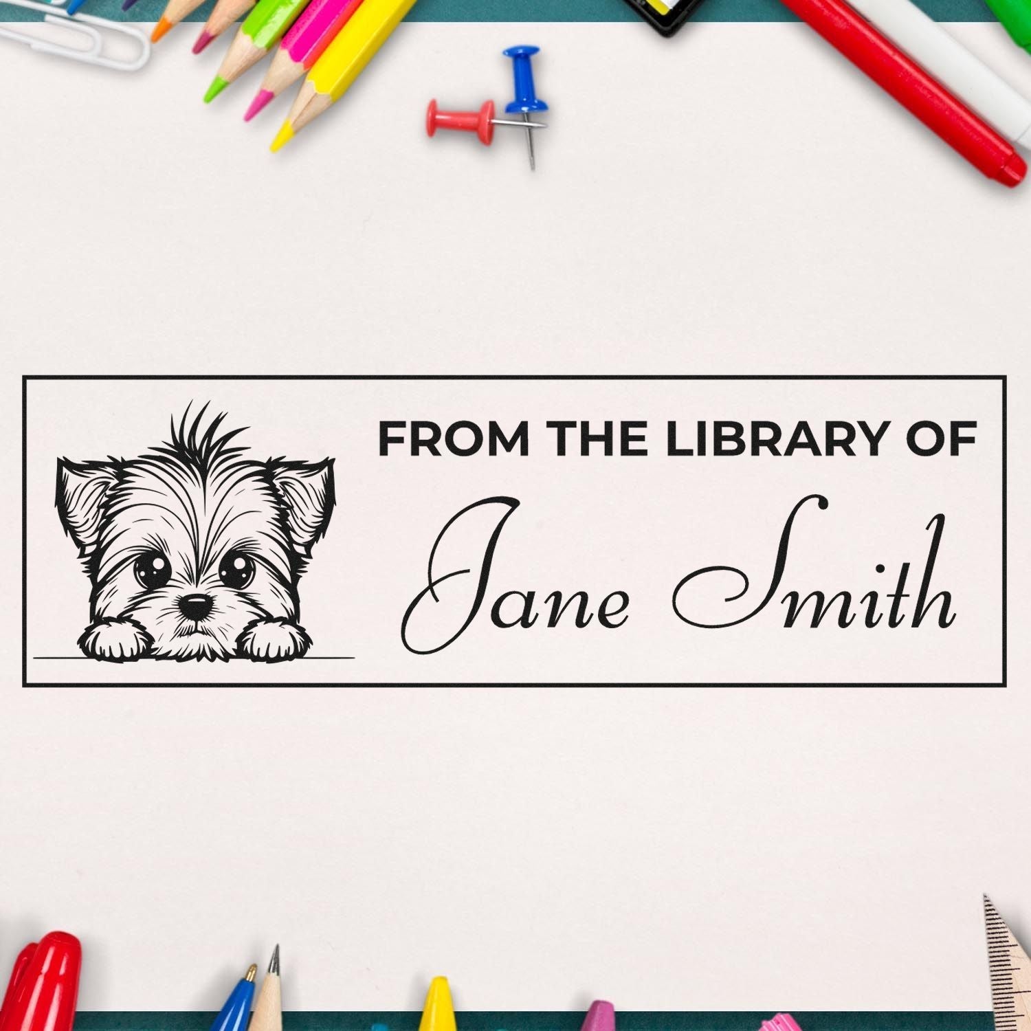 Personalized library rubber stamp with dog illustration and From the Library of Jane Smith for custom book labeling
