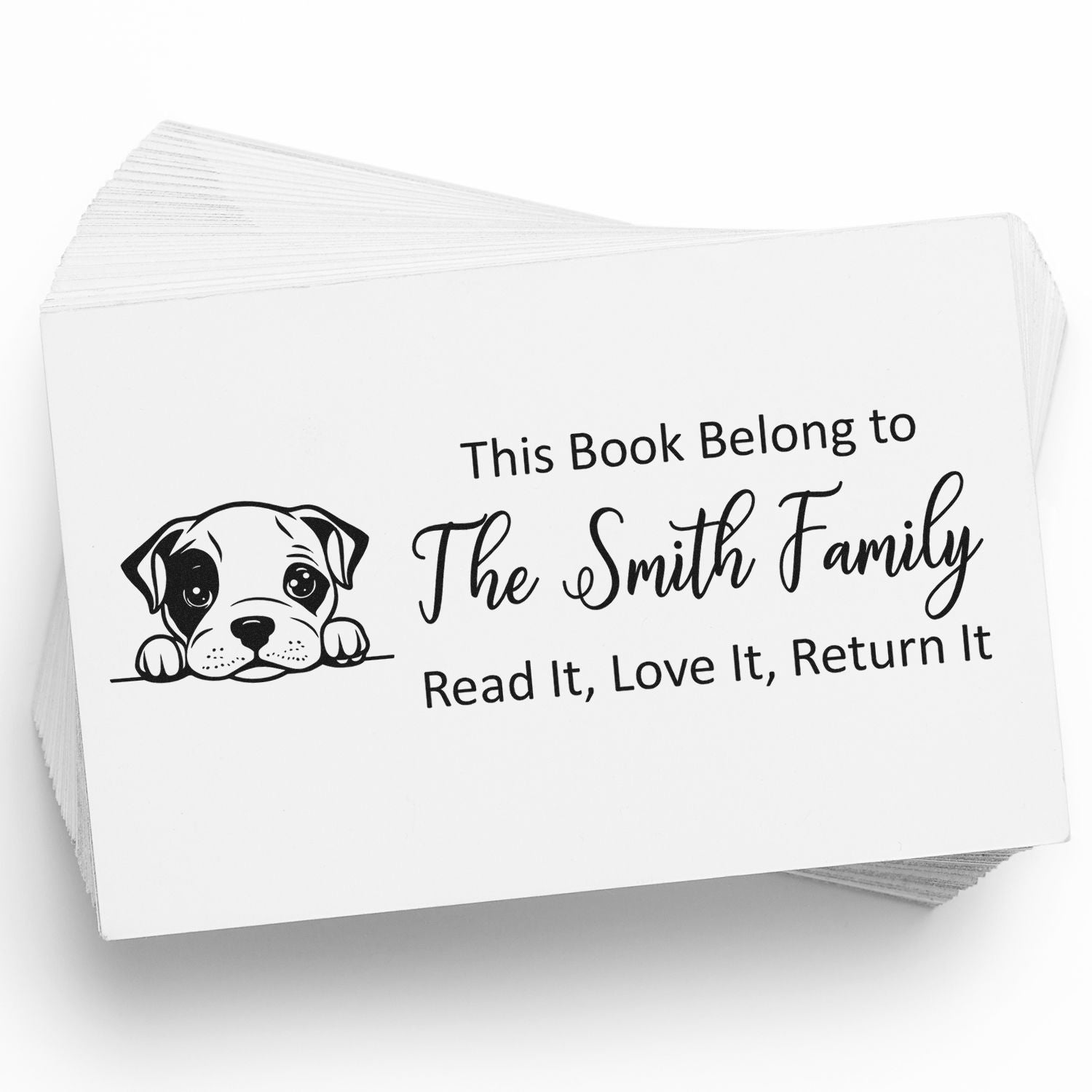 Custom rubber book stamp with dog illustration and This Book Belongs to The Smith Family return-it message.