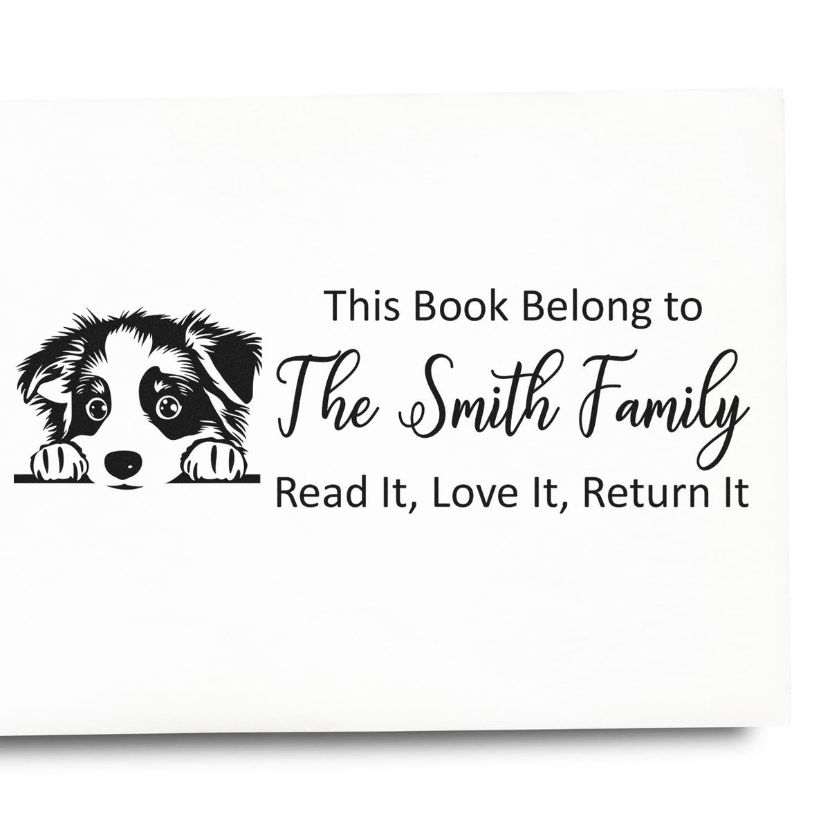 Personalized book rubber stamp with puppy graphic for The Smith Family, reading Read It, Love It, Return It.