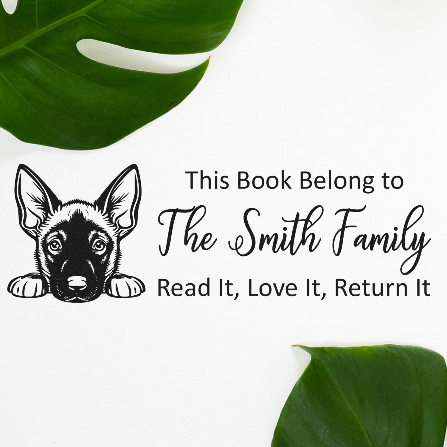 Custom rubber book stamp for The Smith Family, with dog design and Read It, Love It, Return It library text.